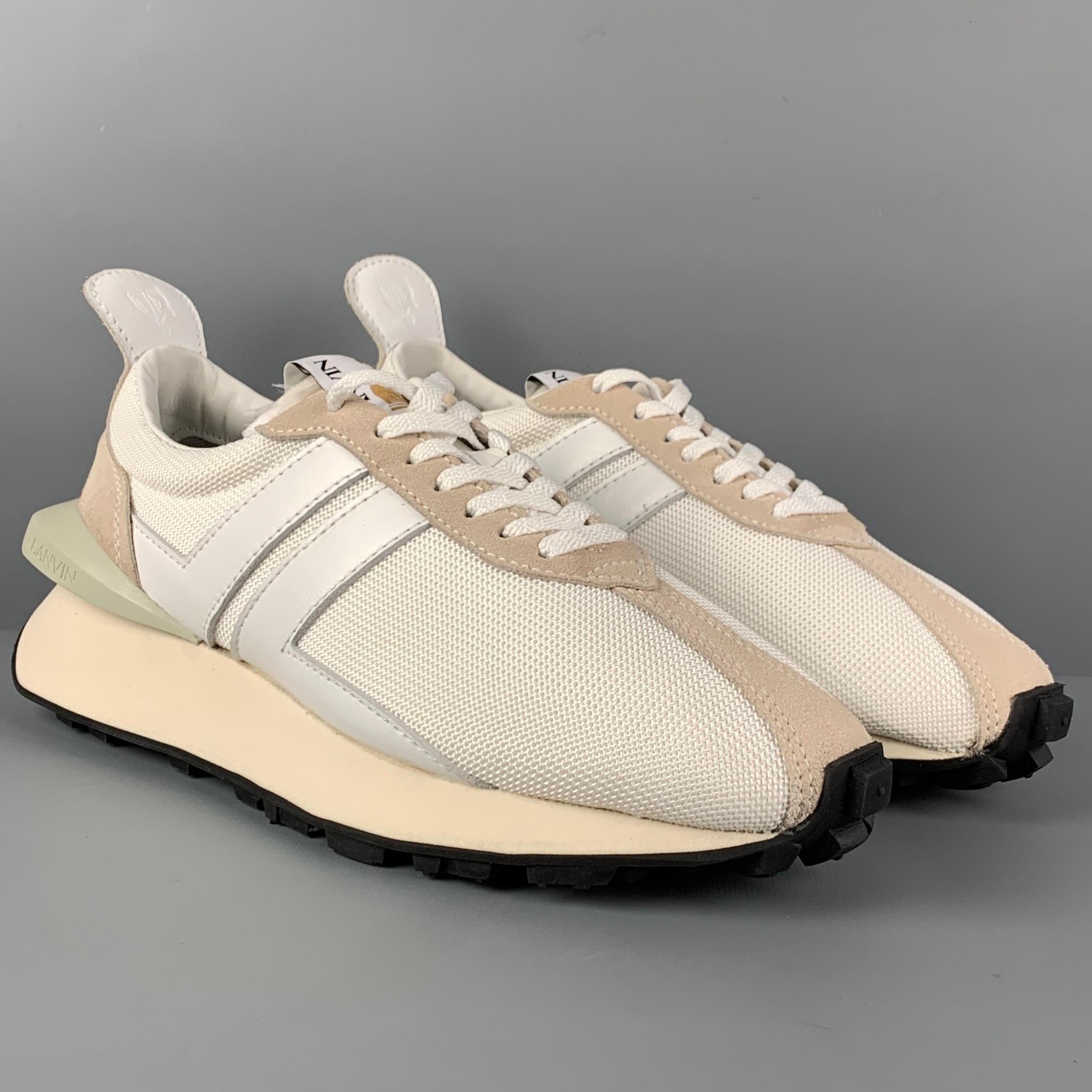LANVIN sneakers comes in a white mixed materials featuring a chunky rubber sole and a lace up closure. Made in Portugal. 

New With Box. 
Marked: 12
Original Retail Price: $550.00

Outsole: 12.5 in. x 4.5 in. 