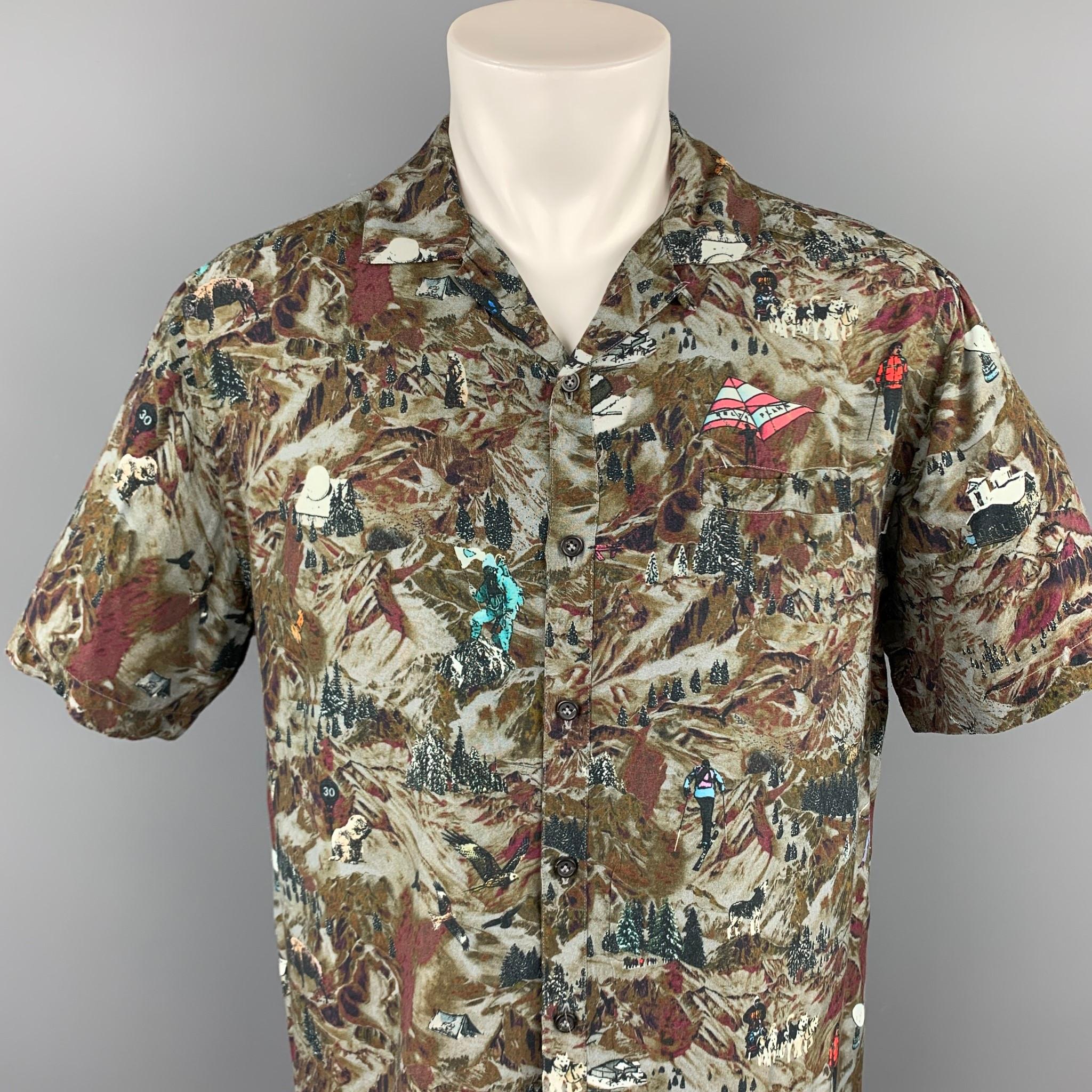 LANVIN camp short sleeve shirt comes in a grey & brown print viscose featuring a button up style, spread collar, and a front slit pocket pocket. Made in Italy.

Very Good Pre-Owned Condition.
Marked: 41/46

Measurements:

Shoulder: 19 in. 
Chest: 46