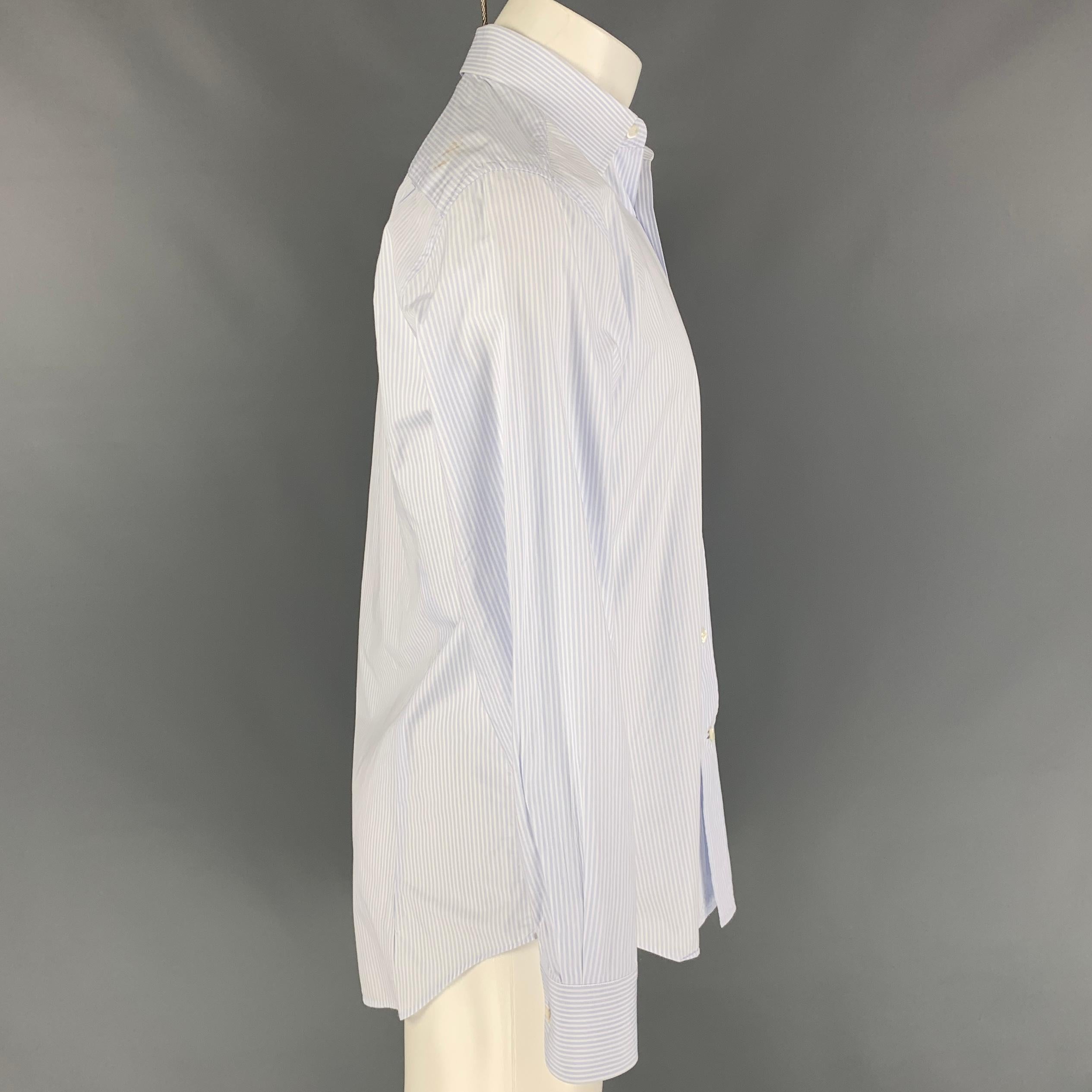 LANVIN long sleeve shirt comes in a light blue & white stripe cotton featuring a spread collar and a buttoned closure. Made in Italy. 

Good Pre-Owned Condition. Discoloration at back.
Marked: 39/15.5

Measurements:

Shoulder: 18.5 in.
Chest: 42