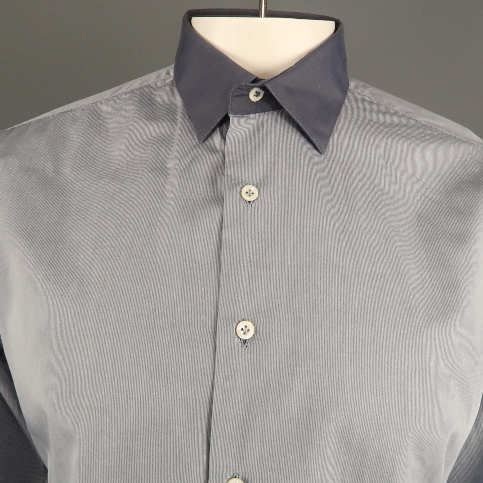 LANVIN long sleeve shirt comes in a navy cotton featuring a classic button up style and a contrast spread collar. Made in Italy.
 
Very Good Pre-Owned Condition.
Marked: 41
 
Measurements:
 
Shoulder: 17.5 in.
Chest: 46 in.
Sleeve: 26.5 in.
Length: