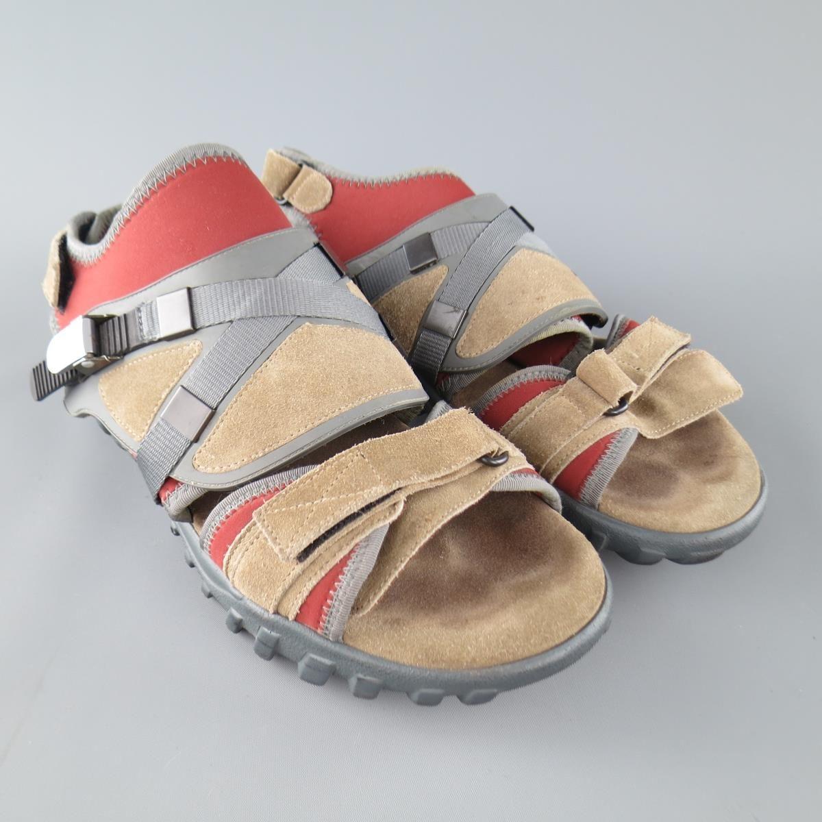 LANVIN athletic sandals consists of suede, neoprene and rubber material in a neutral tone. Detailed with front adjustable straps around the front and mid-section of foot, as well hook and loop-strap around the back heel. Suede accents of taupe are