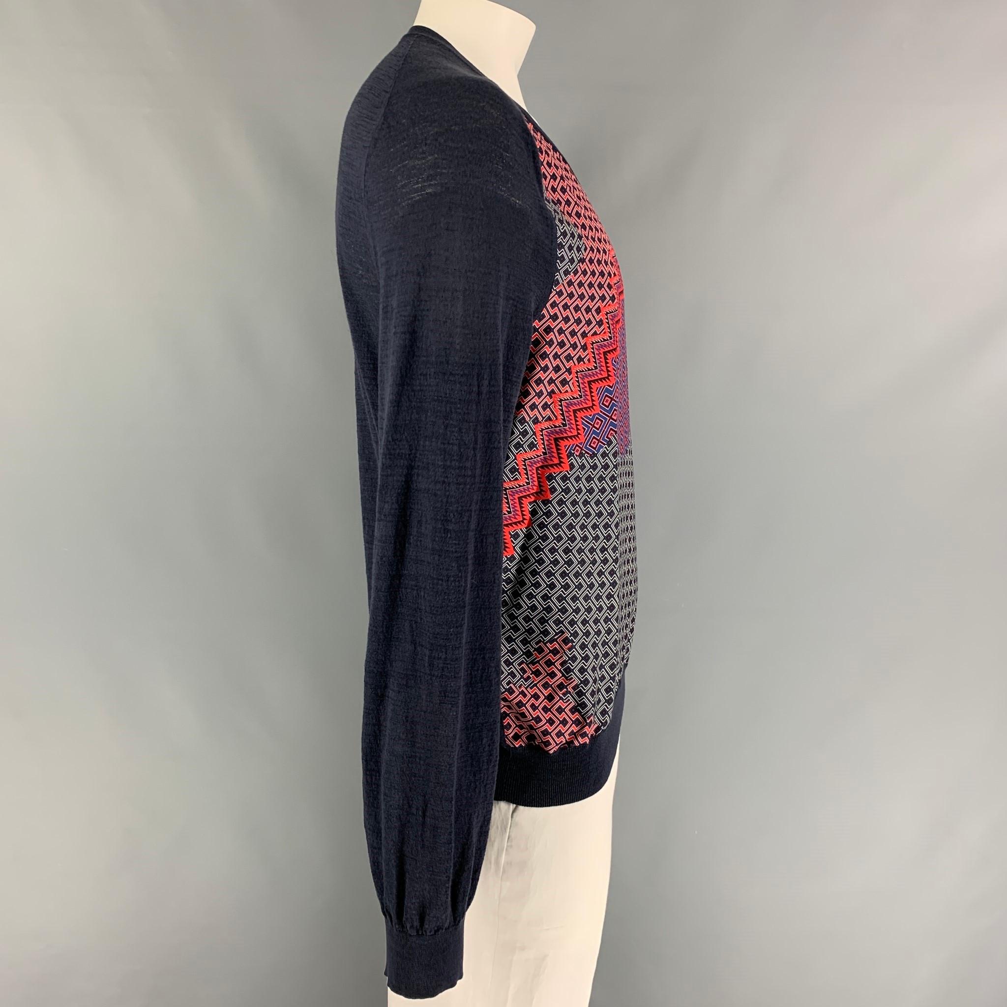 LANVIN pullover comes in a navy & red print cotton / nylon featuring a v-neck. Made in Italy. 

New With Tags. 
Marked: XL

Measurements:

Shoulder: 17 in.
Chest: 44 in.
Sleeve: 34 in.
Length: 26.5 in. 