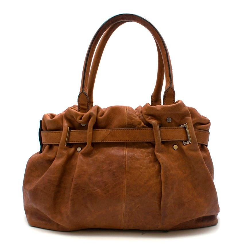 Lanvin Tan Brown Leather Belter Shoulder Bag
- Super smooth & soft leather shoulder bag
- Ruched trim and belt fastening. 
- Small embossed Lanvin Paris on internal zip pocket
- Fully lined with two compartments and a zip center pocket 
- Gold-tone