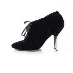 Lanvin, velvet ankle boots with metal heel.