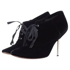 Lanvin, velvet ankle boots with metal heel.