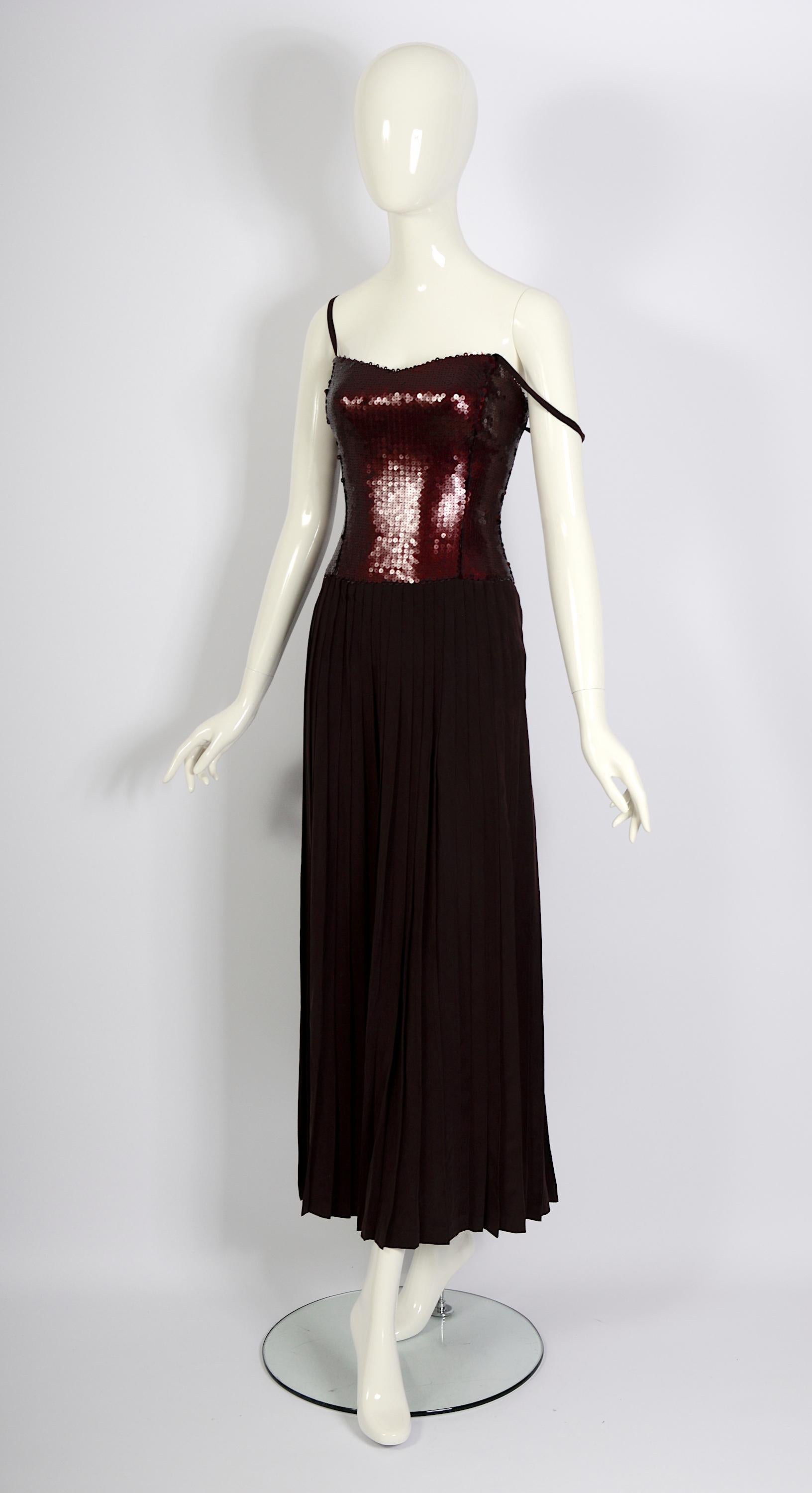 Lanvin vintage 1990 Claude Montana Era Brown Silk Pleated Skirt & Sequin Bodice Dress. 

Experience the timeless elegance of this stunning Lanvin Paris dress from the Claude Montana era. 

Crafted from luxurious 100% silk, this exquisite piece