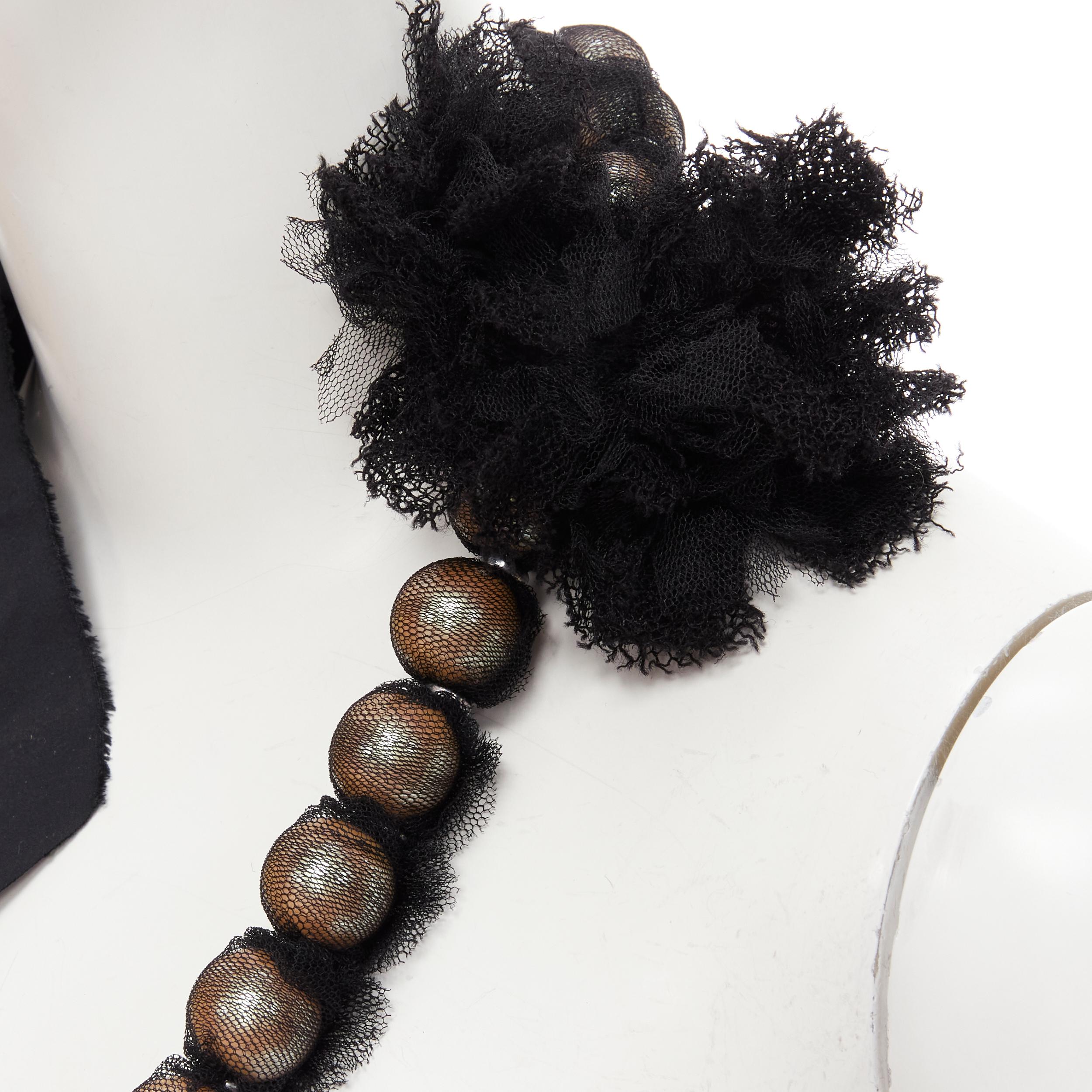 LANVIN Vintage Alber Elbaz black net wrapped pearl grosgrain ribbon necklace
Brand: Lanvin
Designer: Alber Elbaz
Material: Pearl
Color: Black
Pattern: Solid
Extra Detail: Self tie grosgrain ribbon.

CONDITION:
Condition: Excellent, this item was