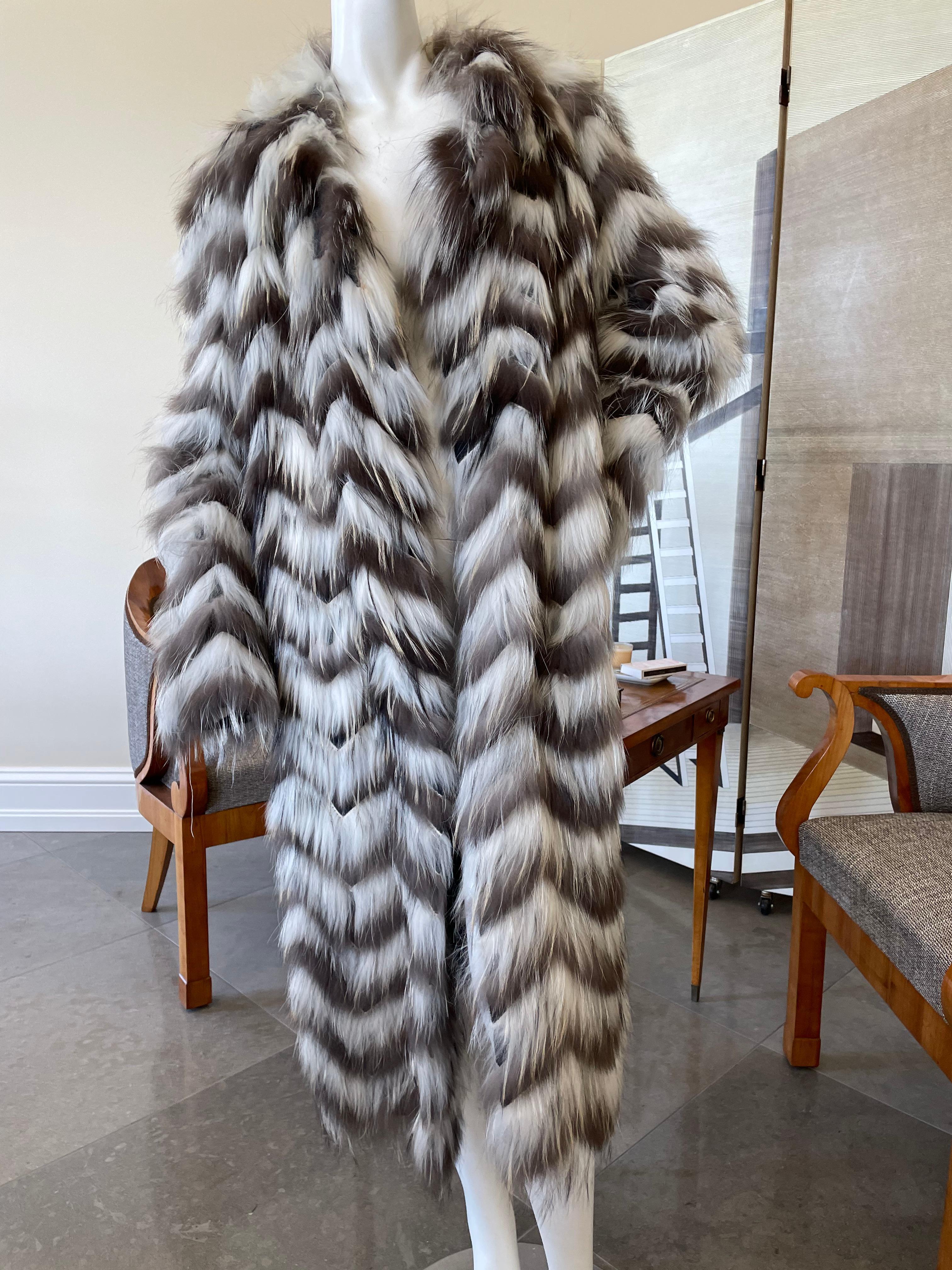 Lanvin Chevron Pattern Lightweight Feathered Fox Fur Coat 
Very lightweight, lined in wool.
Size 40
Bust  44