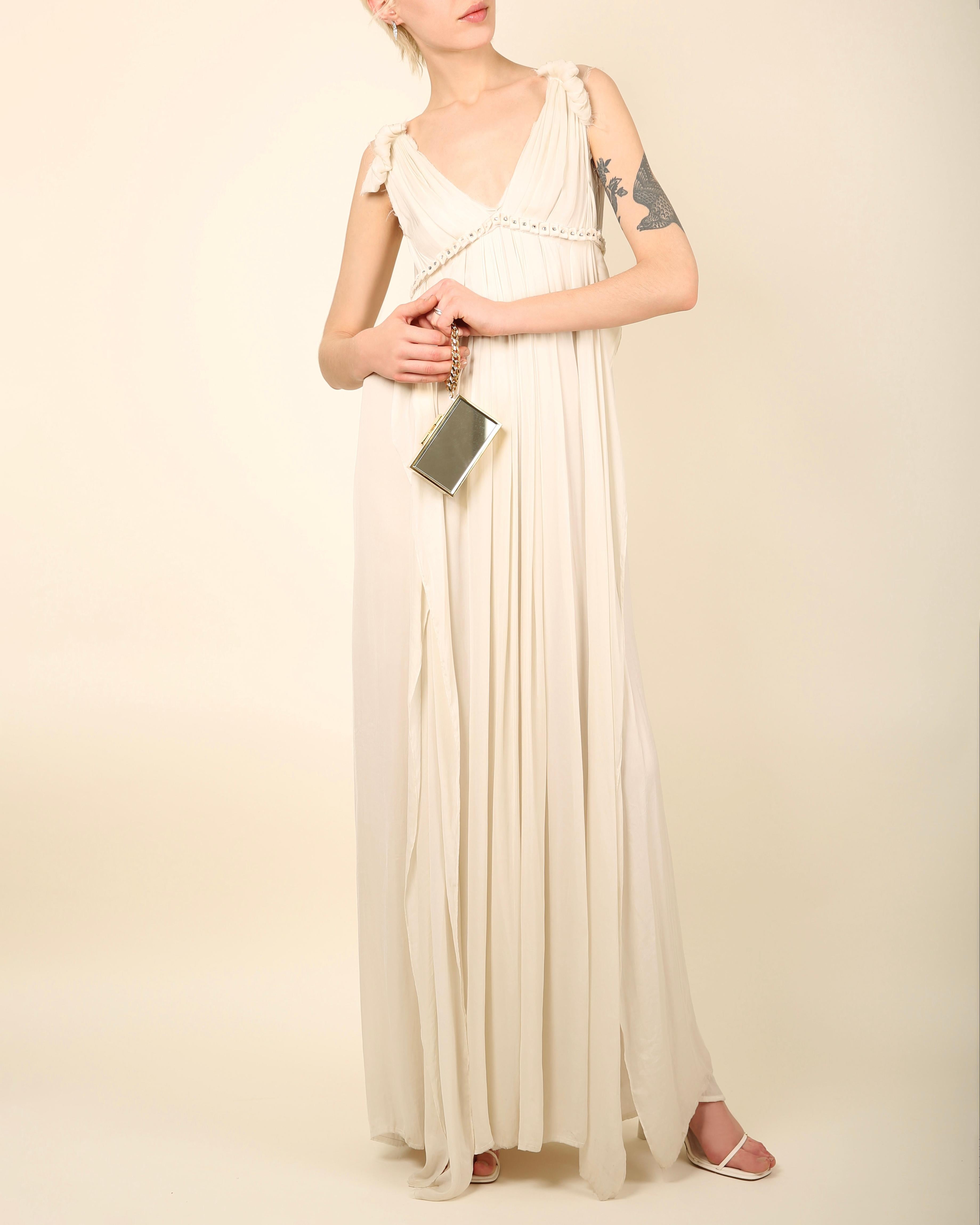 Lanvin Paris Collection Blanche Resort 2011
A beautiful floor length grecian style loose fitting ivory gown with crystal embellished waist band that would work beautifully as wedding or evening dress
Double layered dress that falls in ripples of
