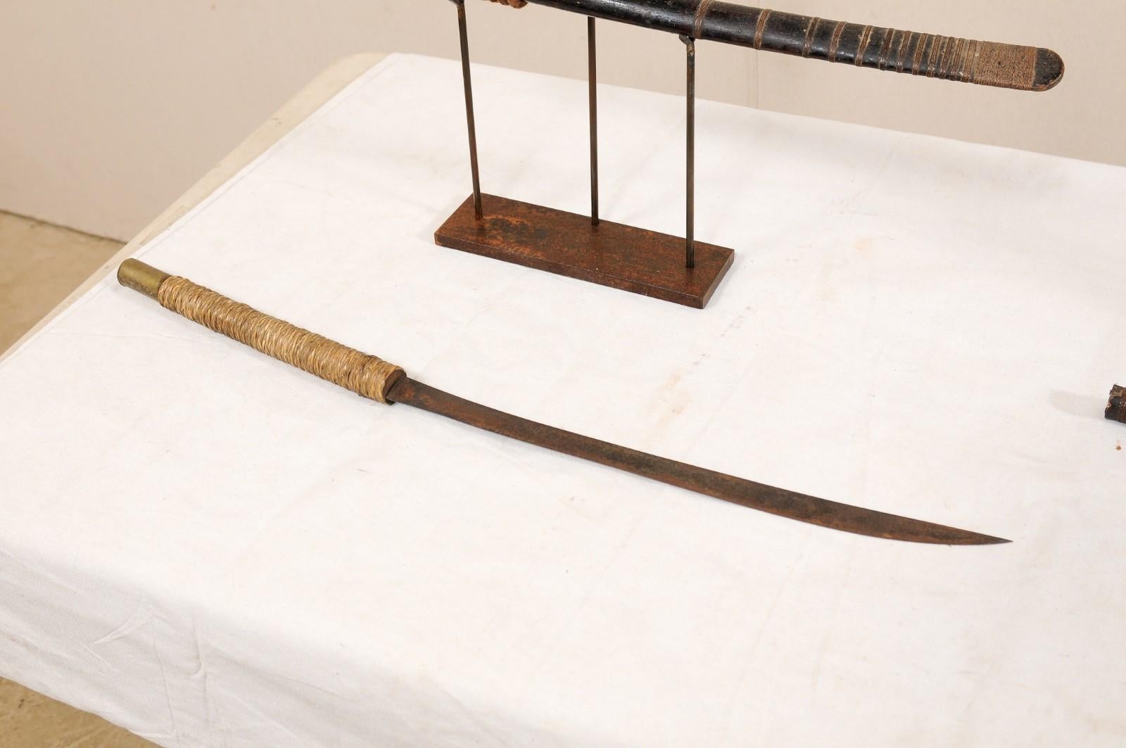Laotian Pair of 19th Century Daab Swords Presented on Custom Stands In Good Condition For Sale In Atlanta, GA