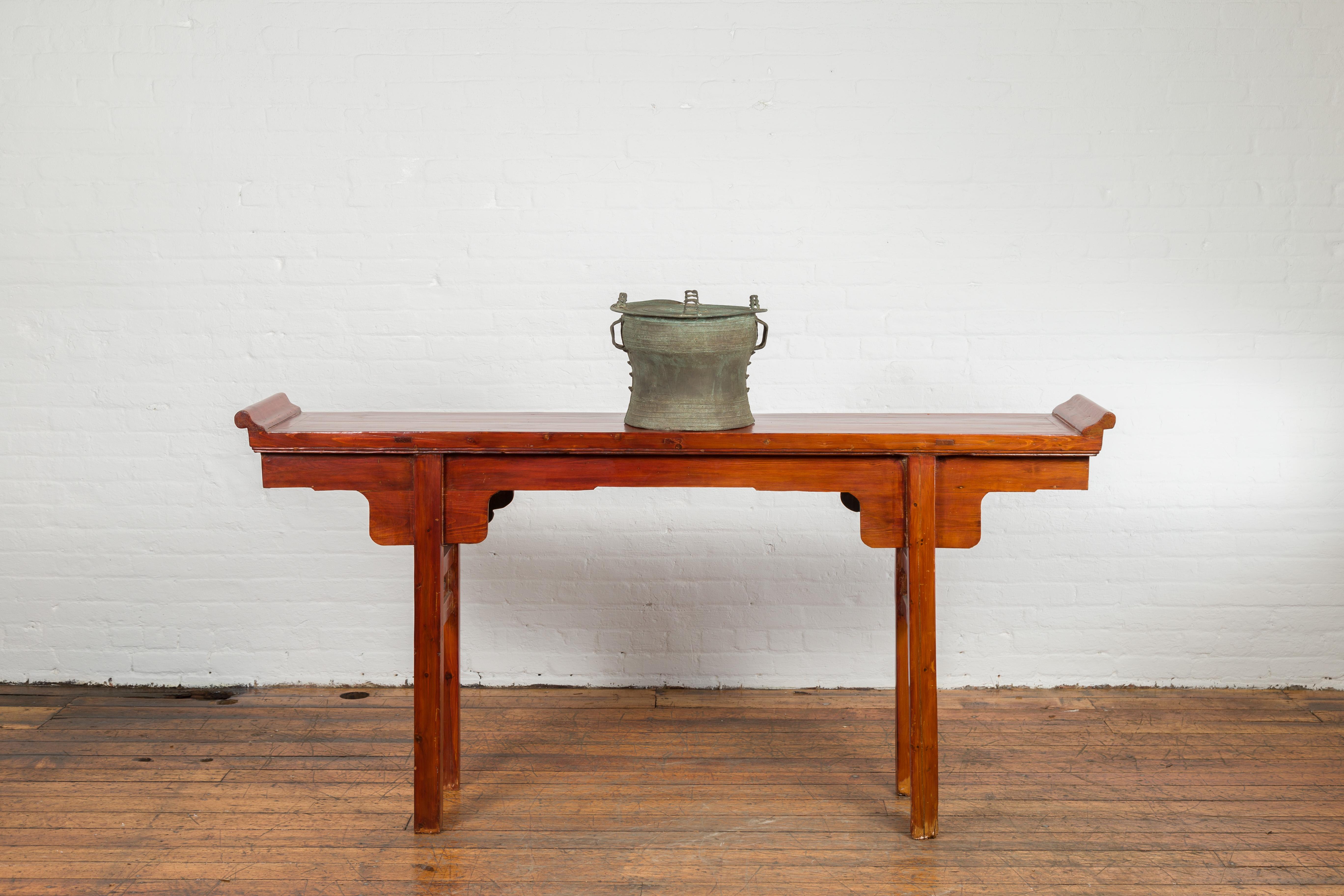 A small Laotian style bronze rain drum side table from the mid-20th century, with geometric relief motifs and central sun. created during the midcentury period, this bronze drum table (named for the lovely sound that such tables make when hit by