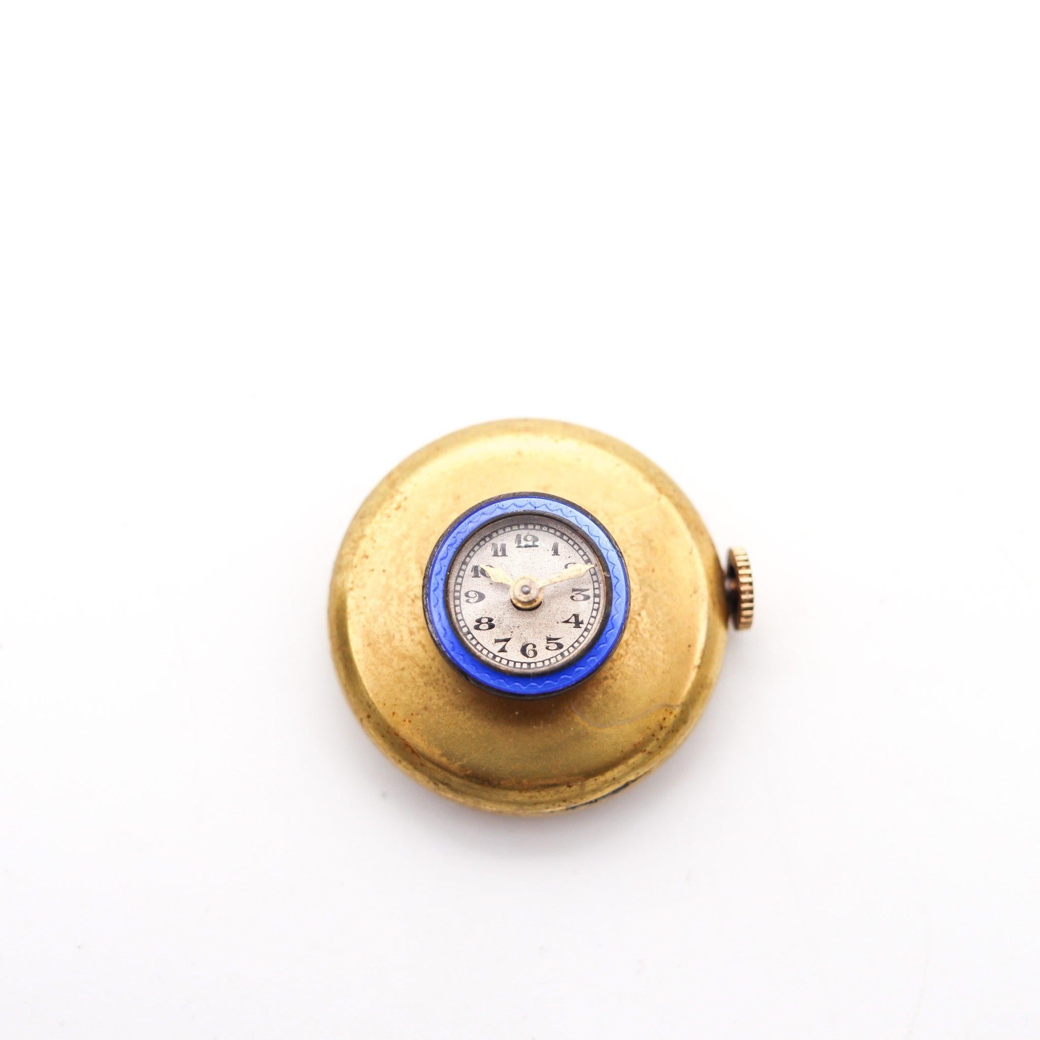 An art deco enameled lapel watch.

This is a very unusual and handsome lapel watch, created in Switzerland during the art deco period, back in the 1915. The rare watch was crafted with parts made up in gilded brass and sterling silver which is