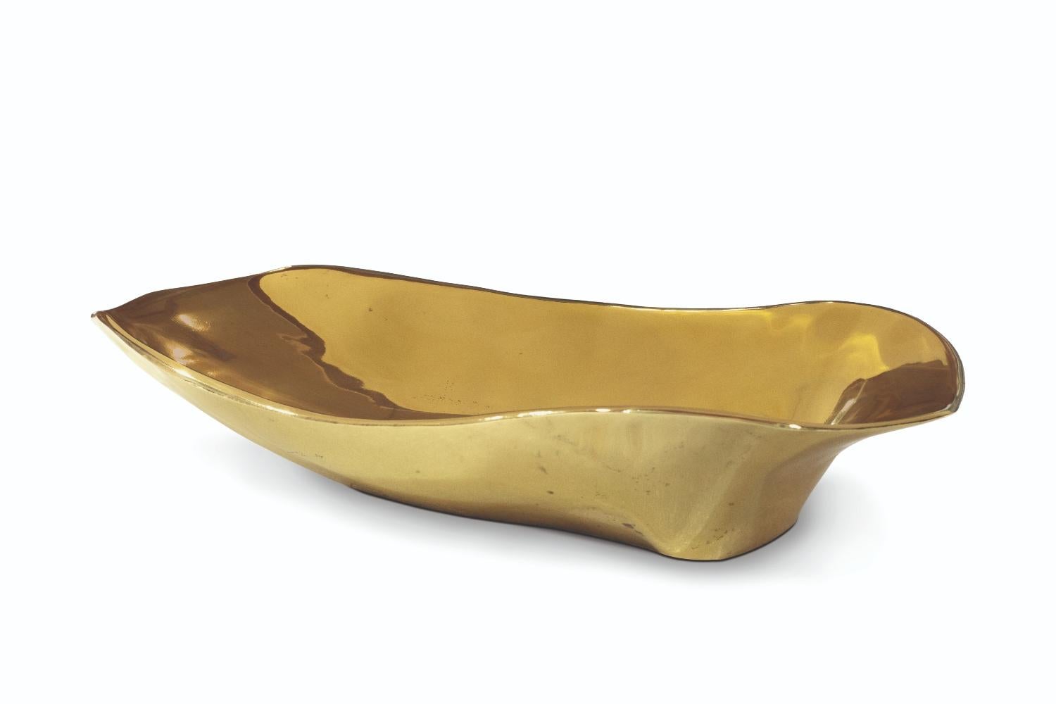 The Lapiaz vessel sink made of casted brass can be gold, nickel and copper-plated or even lacquered in any color. This irregular shaped piece will add to your bathroom the modern look you are searching for. You are able to combine it with many