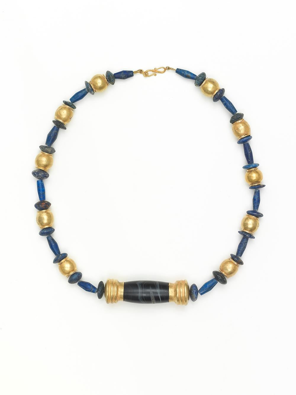 Bactrian culture spread across a wide area of modern-day Afghanistan and Uzbekistan and reached its zenith between 2100 and 1700 B.C. It produced many unique and distinctive objects and jewellery. 

A stunning beaded necklace comprising of both