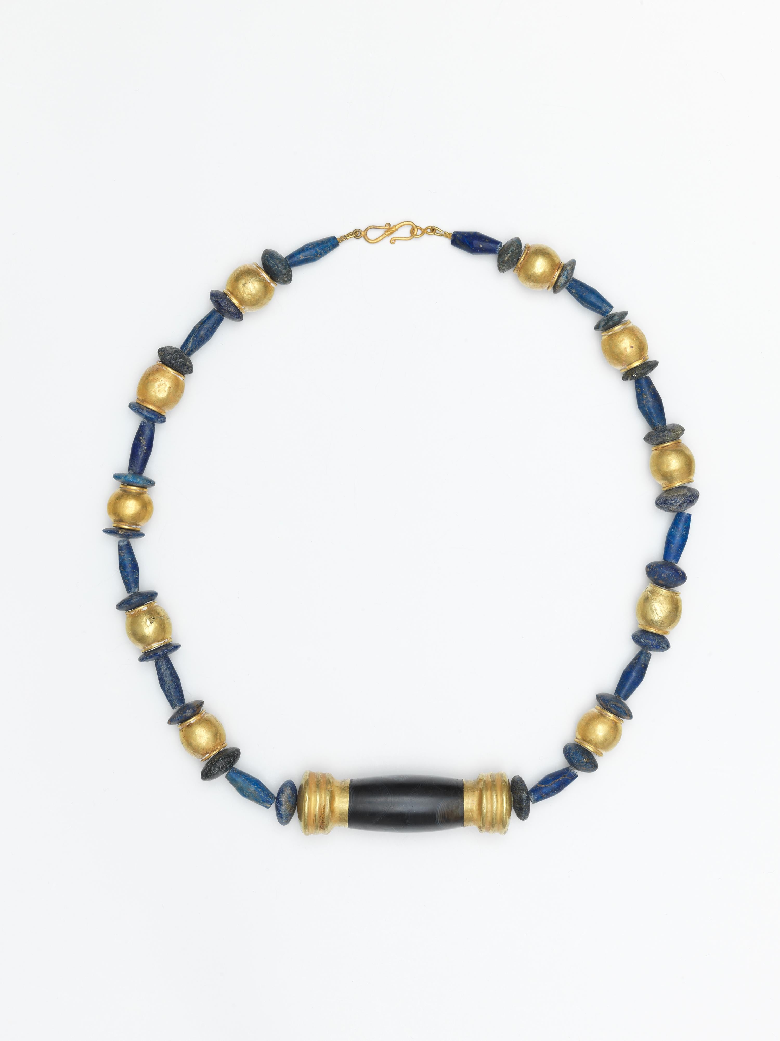 Mixed Cut  Lapis and Gold Beaded Necklace, with Central Gold-Capped Black Agate  For Sale