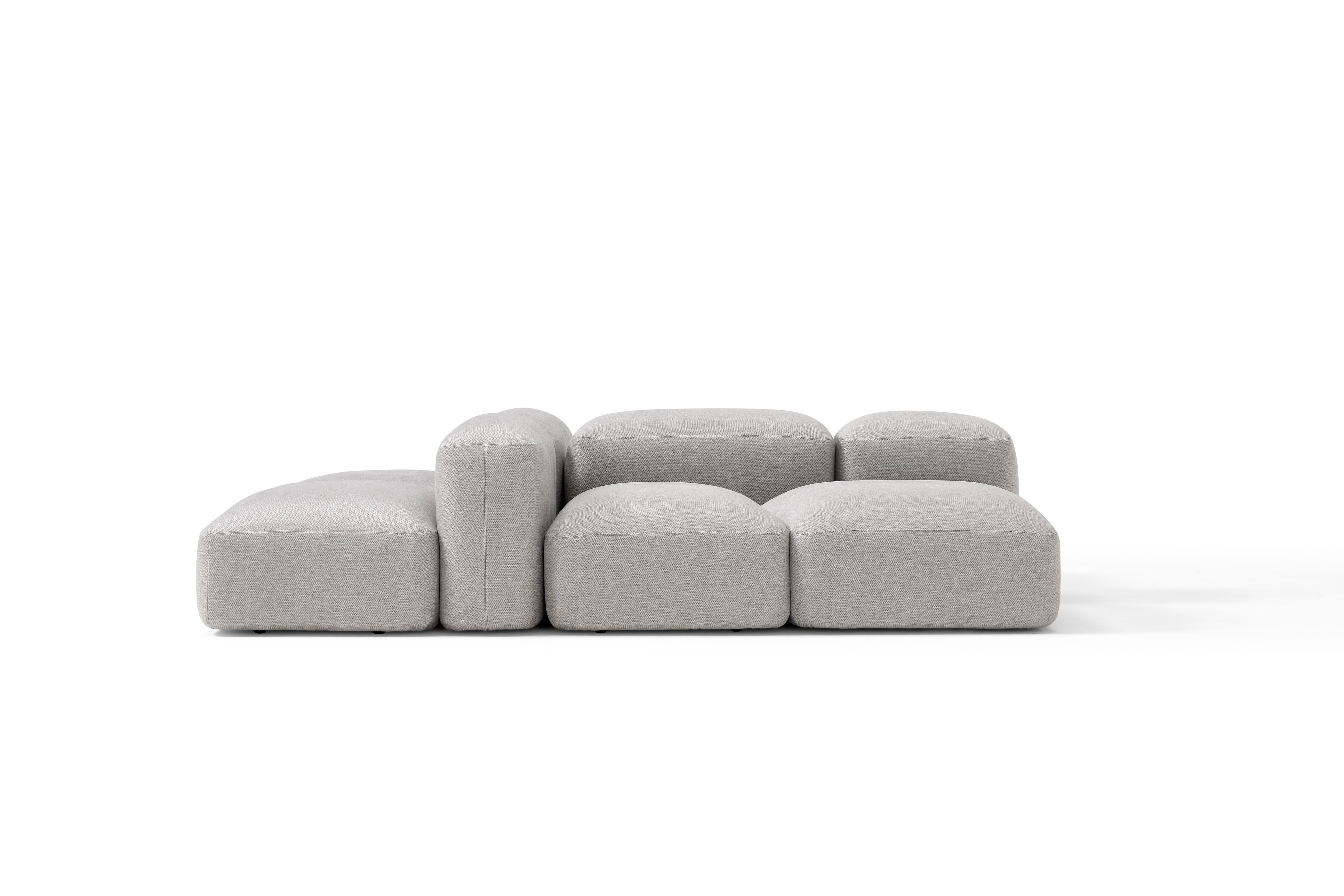 Lapis Fabric Sofa Composition by Amura Lab
Dimensions: W 264 x D 180 x H 70 cm
Materials: FRAME: solid wood and multiply. SUSPENSIONS: rubber and polypropylene belts. SEAT, BACK AND ARMREST: polyurethane foam, density 30 kg/m³ and memory foam.

A