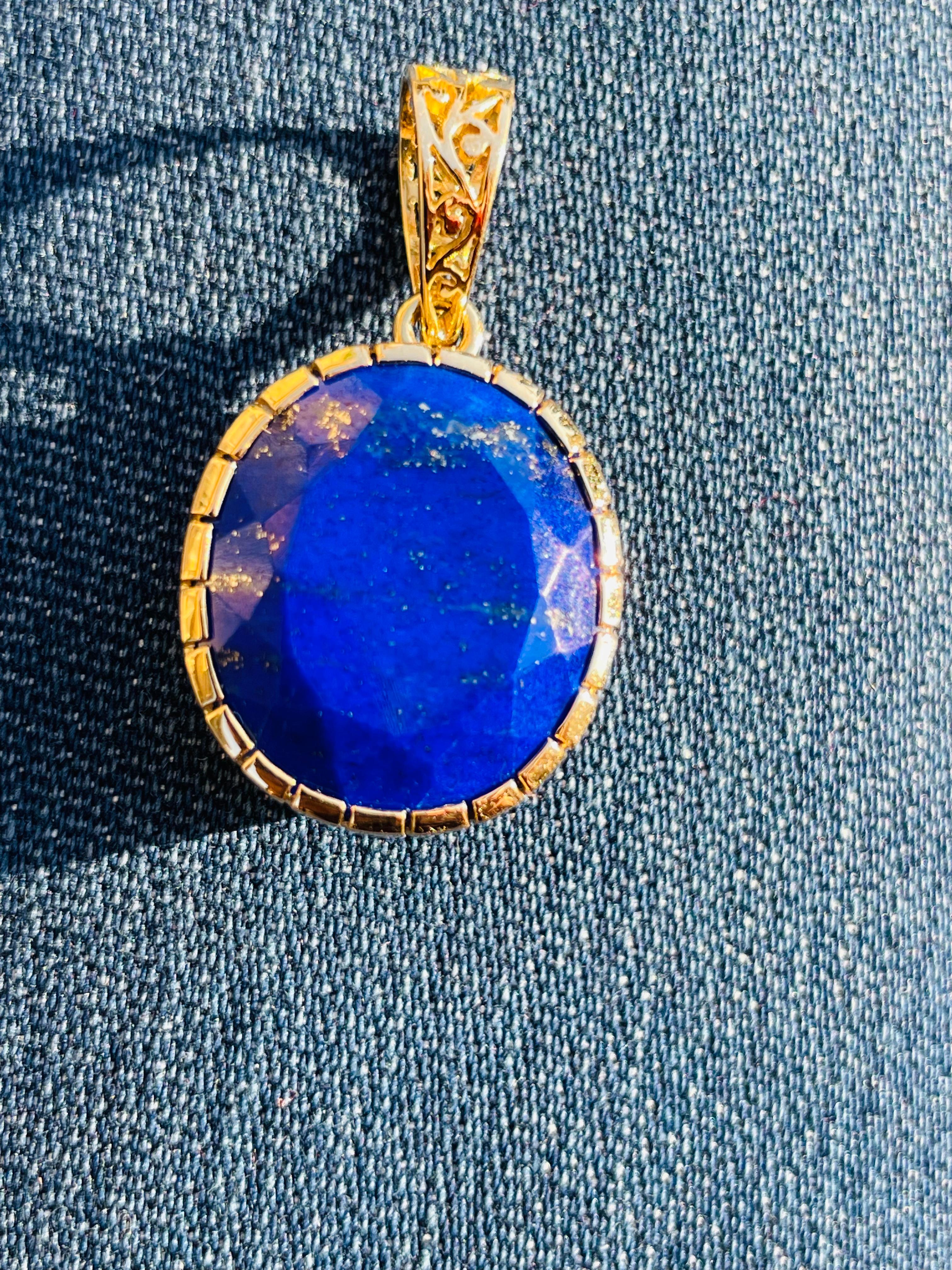 Lapis pendant in 18K Gold. It has a oval cut gemstone that completes your look with a decent touch. Pendants are used to wear or gifted to represent love and promises. It's an attractive jewelry piece that goes with every basic outfit and wedding