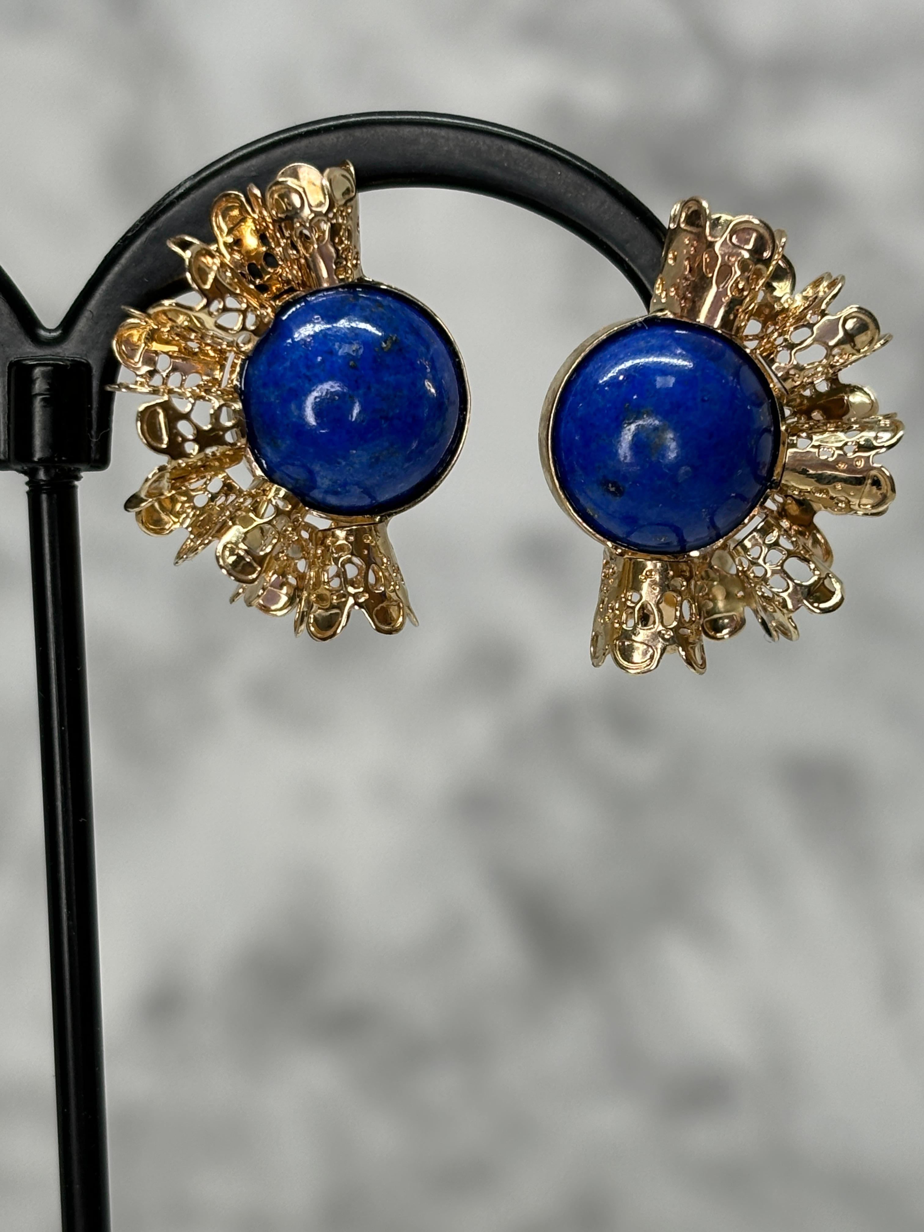 Lapis lazuli gold earrings are a striking and elegant choice, combining the deep, celestial blue of lapis lazuli with the warm luster of gold. This combination is not only visually appealing but also carries historical and cultural significance.