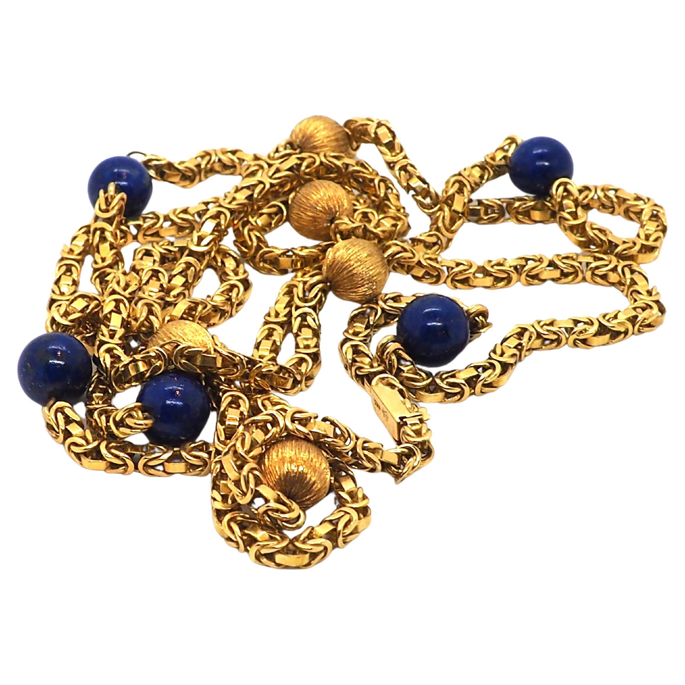 Vintage Art deco Necklace from 1950 made of yellow gold, decorated with 5 lapis lazuli balls and 5 more made of gold wit 9.35mm on a box type chain

Length 102 cm 
Total weight 80.2g

All our pieces have been carefully chosen, restored and prepared