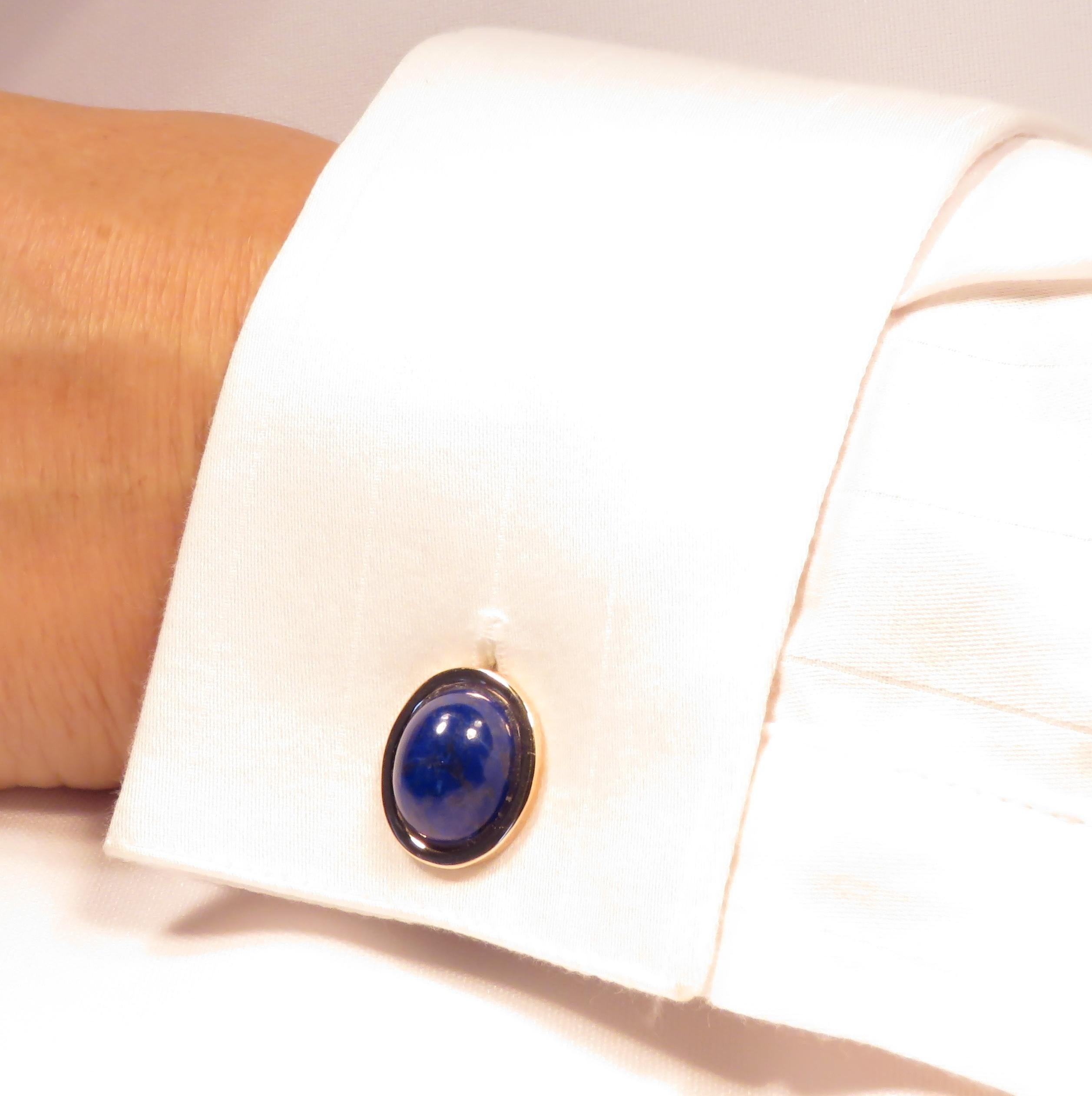Beautiful cufflinks crafted in 9 karat white gold with two natural cabochon oval lapis lazuli and two natural lapis lazuli beads. Oval gemstones size is : 12x8 mm / 0.472x0.314 inches, bead size is; 10 mm / 0.393 inches. Marked with the Italian Gold