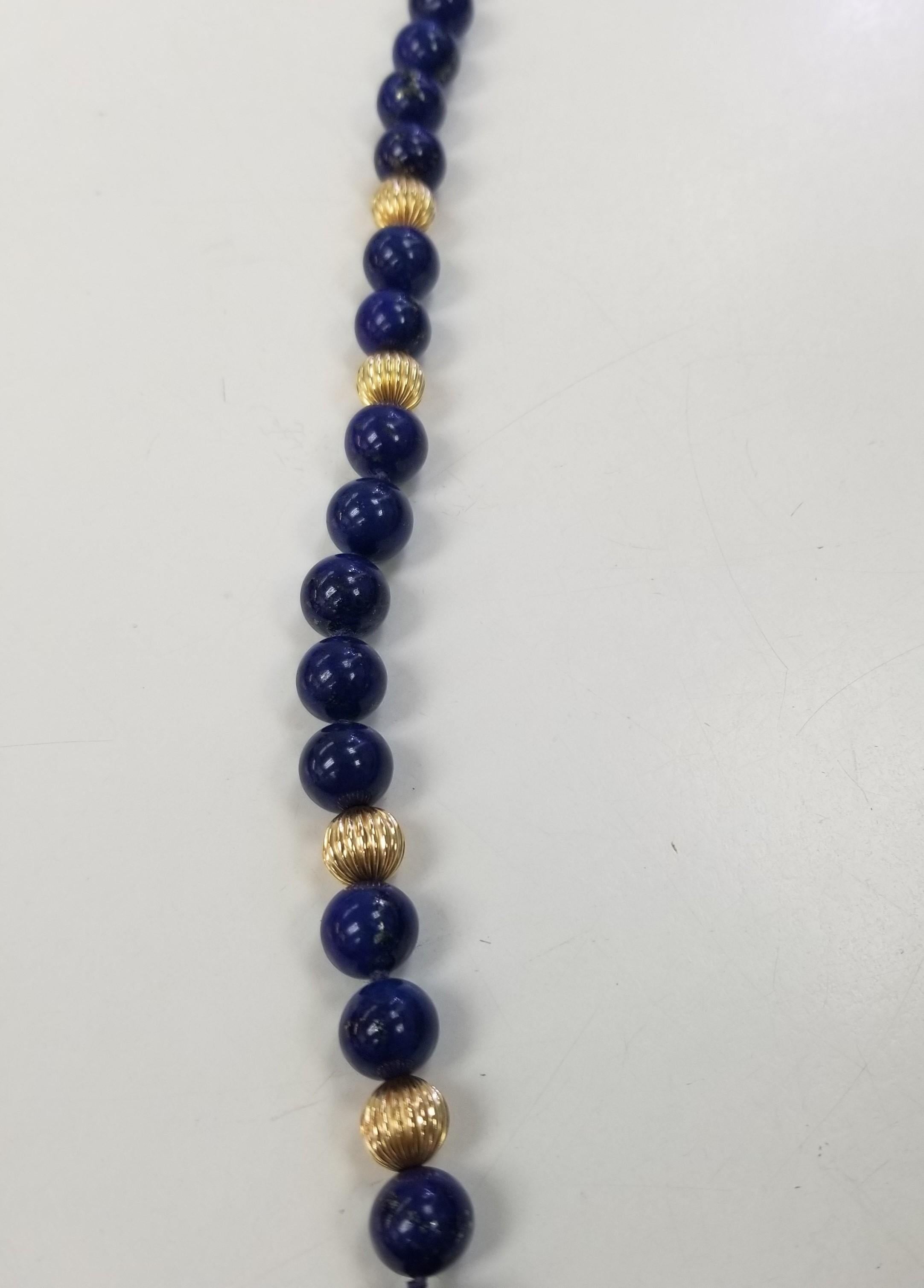 Lapis Lazuli 9.5 - 10mm Beads with 14k yellow gold Rondelle Necklace 36 inches In Excellent Condition For Sale In Los Angeles, CA