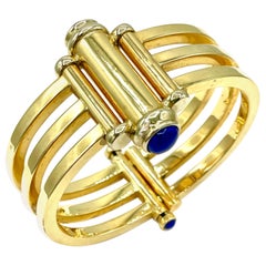 Bracelet à trois rangs en lapis-lazuli et or jaune 18K