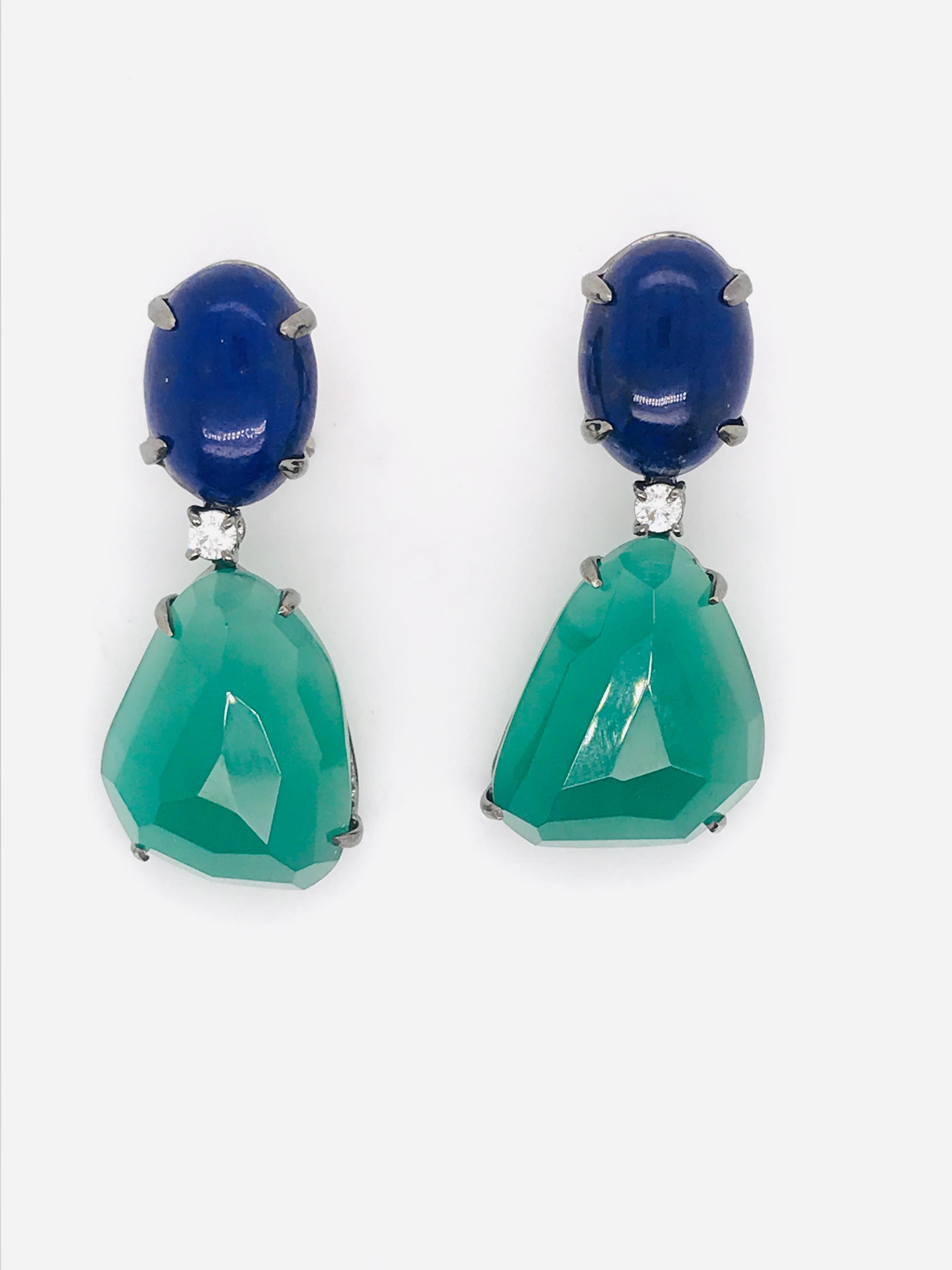 Lapis Lazuli and Green Moonstone, Diamonds with Black Gold 18K Chandelier Earrings:

Elevate your style and captivate onlookers with the mesmerizing allure of these exquisite Lapis Lazuli and Green Moonstone chandelier earrings, adorned with