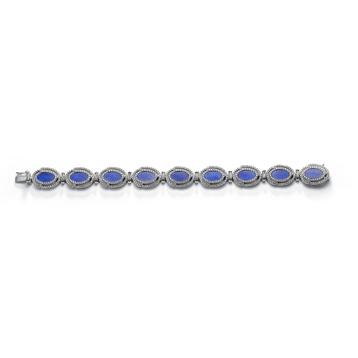 Bracelet in 18kt white gold set with 549 diamonds 3.11 cts and 9 lapis lazuli 8.62 cts       