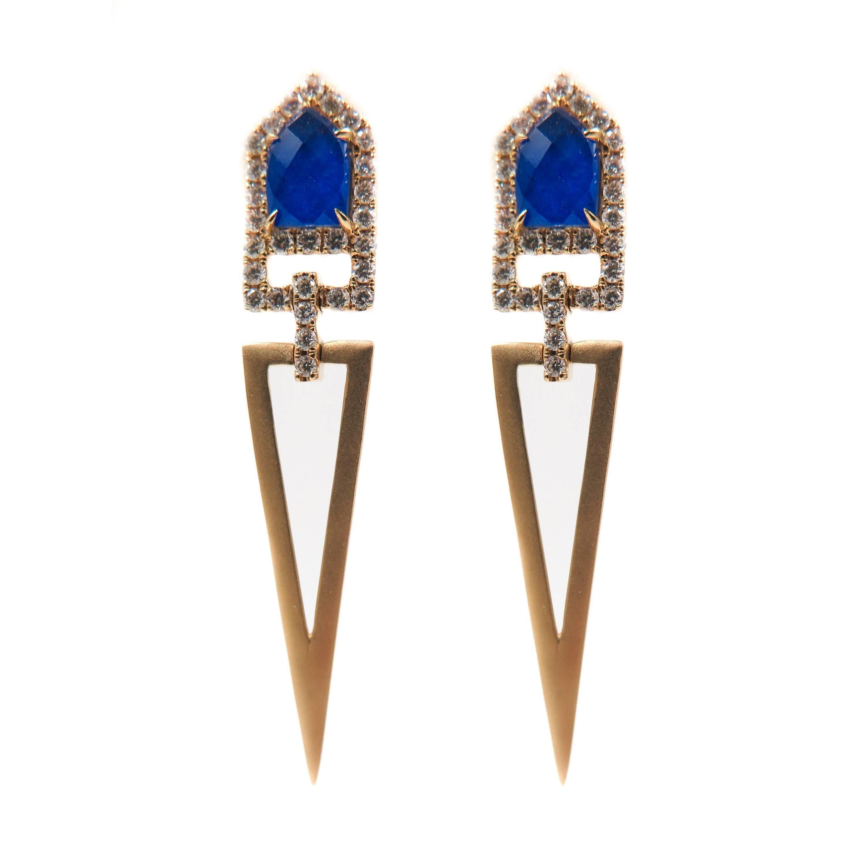 This gorgeous Lapis and Diamond Drop Earrings are the result of overlapping a beautiful faceted clear quartz over a deep blue lapis lazuli, creating that shimmering and eye catching effect. Framed by 56 white round brilliant cut diamonds, weighing