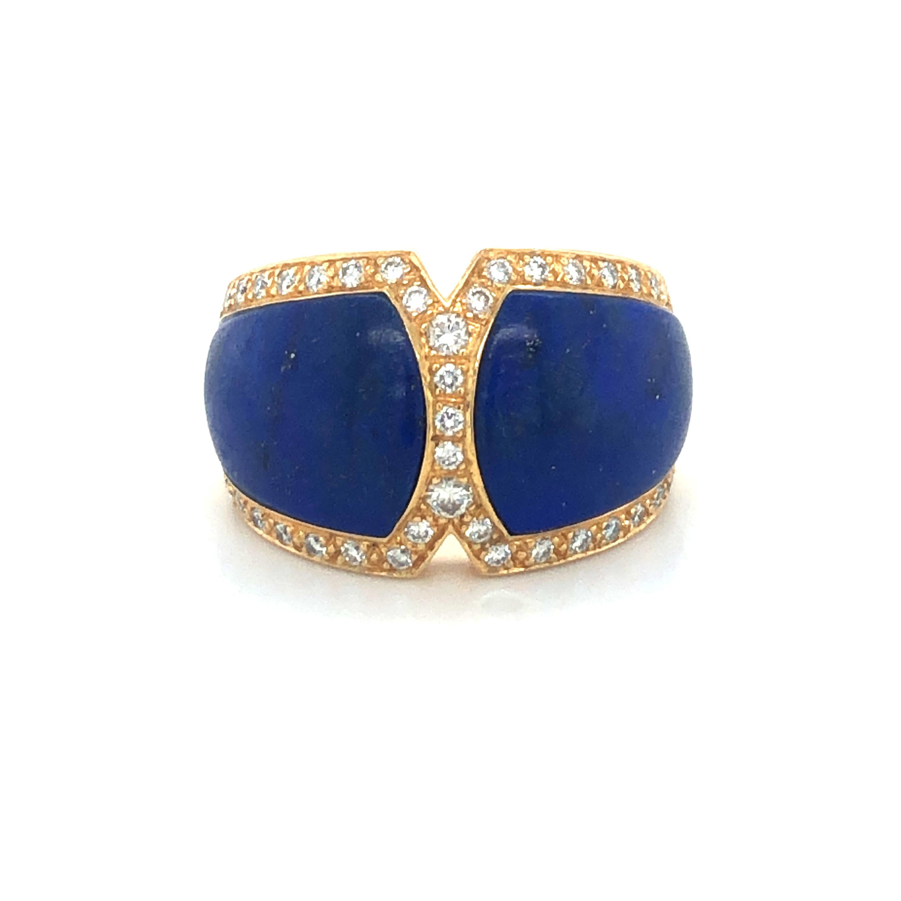This modern and chic ring by reknowned Swiss jeweller Péclard is set with two richly coloured lapis lazuli elements and 37 brilliant-cut diamonds of F/G colour and vvs/vs clarity. 
Famous for its fine workmanship, this Péclard ring is another