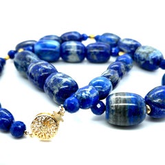 Lapis Lazuli Barrel Shaped Beaded Necklace with Yellow Gold Accents, 22 Inches