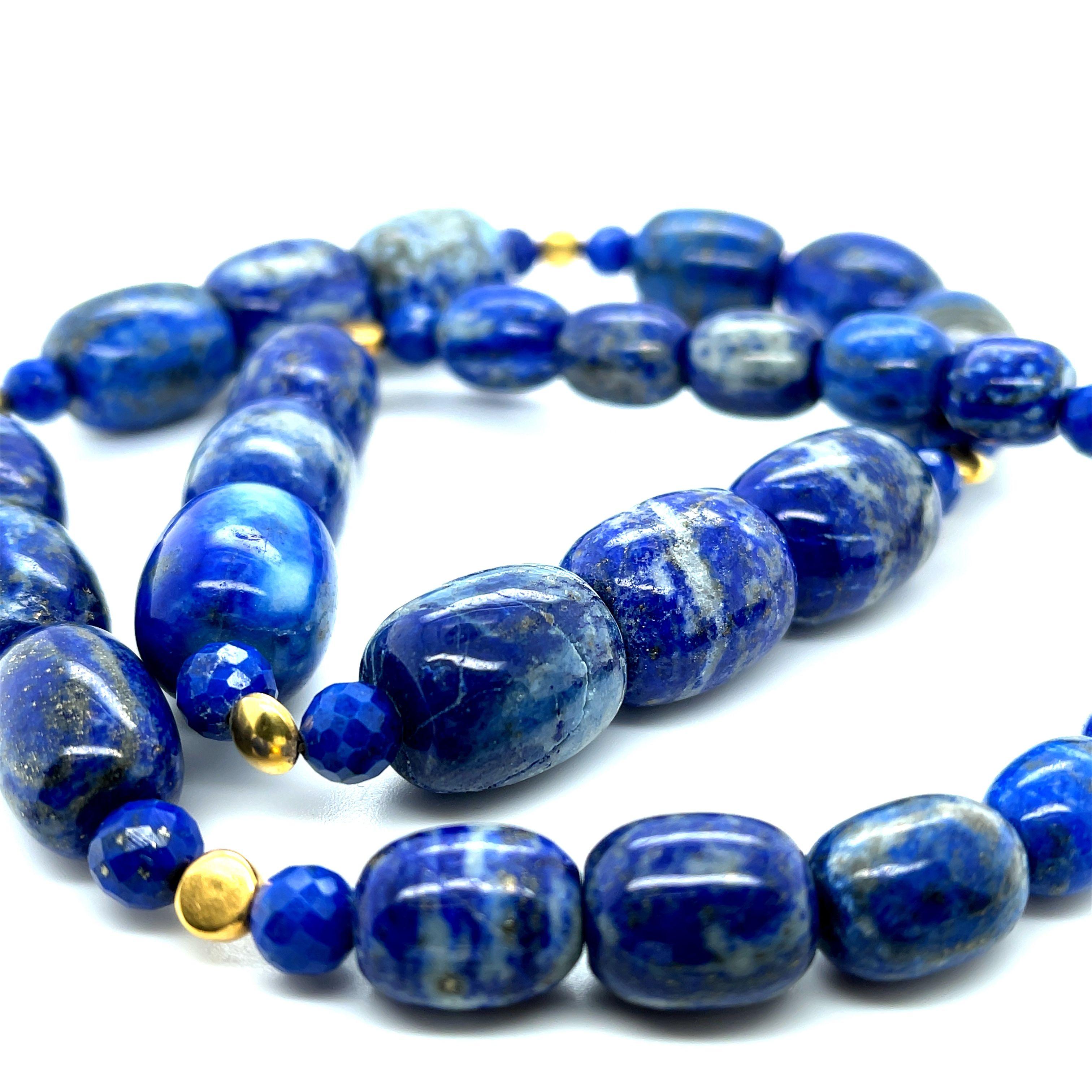 Artisan Lapis Lazuli Barrel Shaped Beaded Necklace with Yellow Gold Accents, 22 Inches For Sale