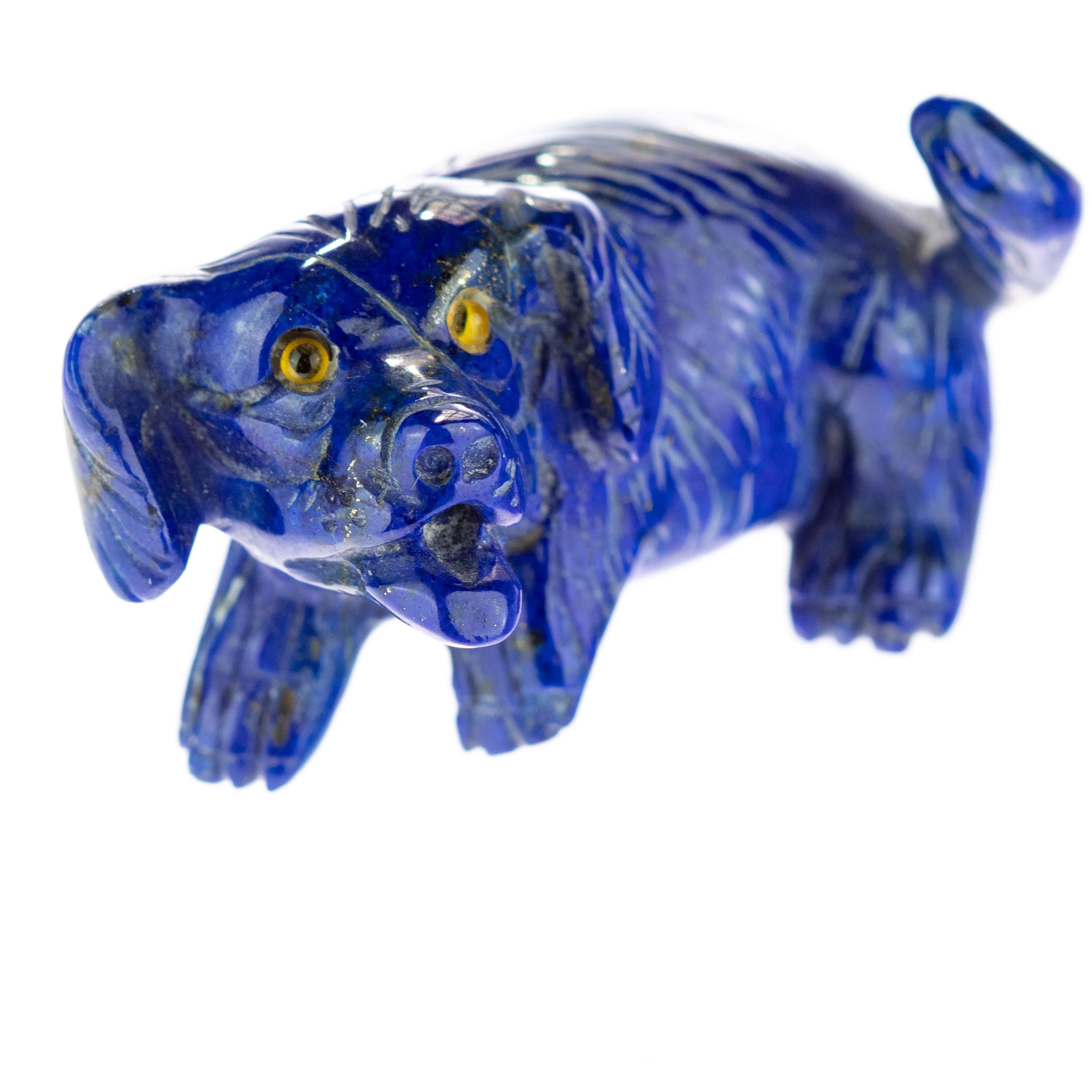 This series of Lapis Lazuli is definitely the part of the collection of which we are more fond of. This dog sculpture from Hong Kong during the 70's. Fall in love with the passionate colour of this precious gem. Fantastic local artists carving raw