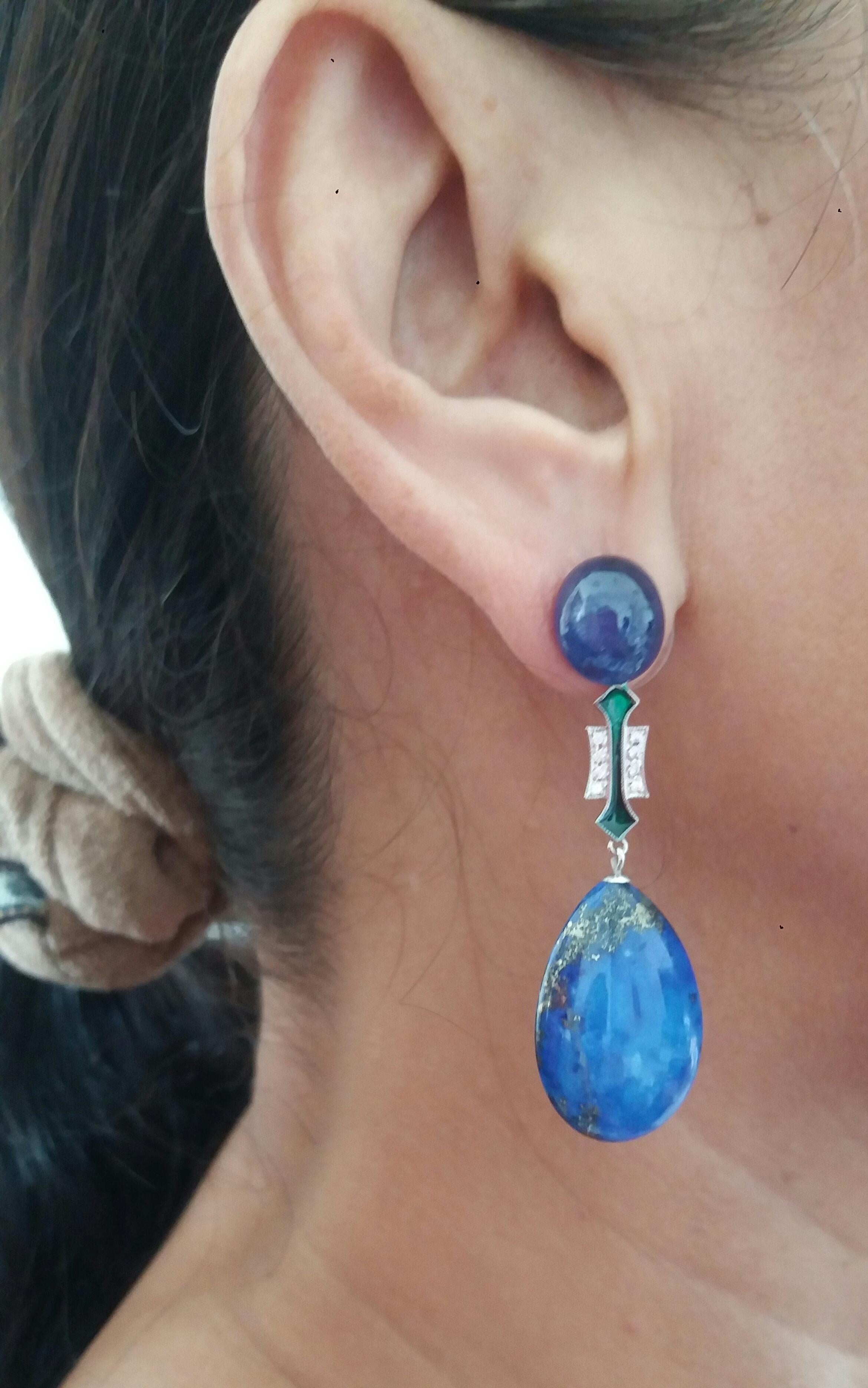2 large blue sapphire cabs are the top, then the middle part is in white gold diamonds and green enamel, the bottom is composed of 2 flat drops in natural Lapis Lazuli.
In 1978 our workshop started in Italy to make simple-chic Art Deco style