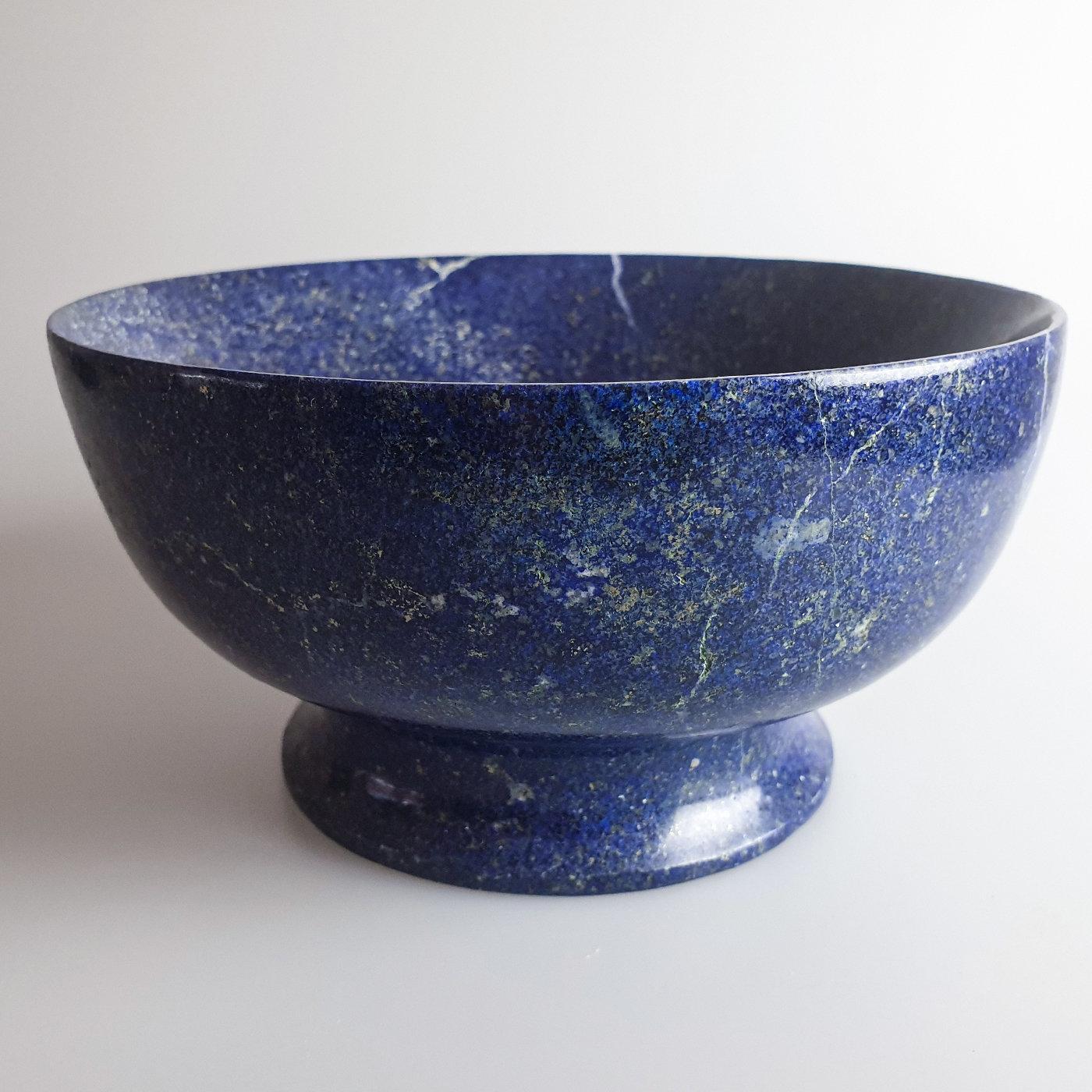 Often referred to as the stone of the gods, this breathtaking lapis lazuli hails from Afghanistan, where the finest quality has been mined for centuries. Crafted out of a single block, this magnificent bowl is a one-of-a-kind piece showcasing its