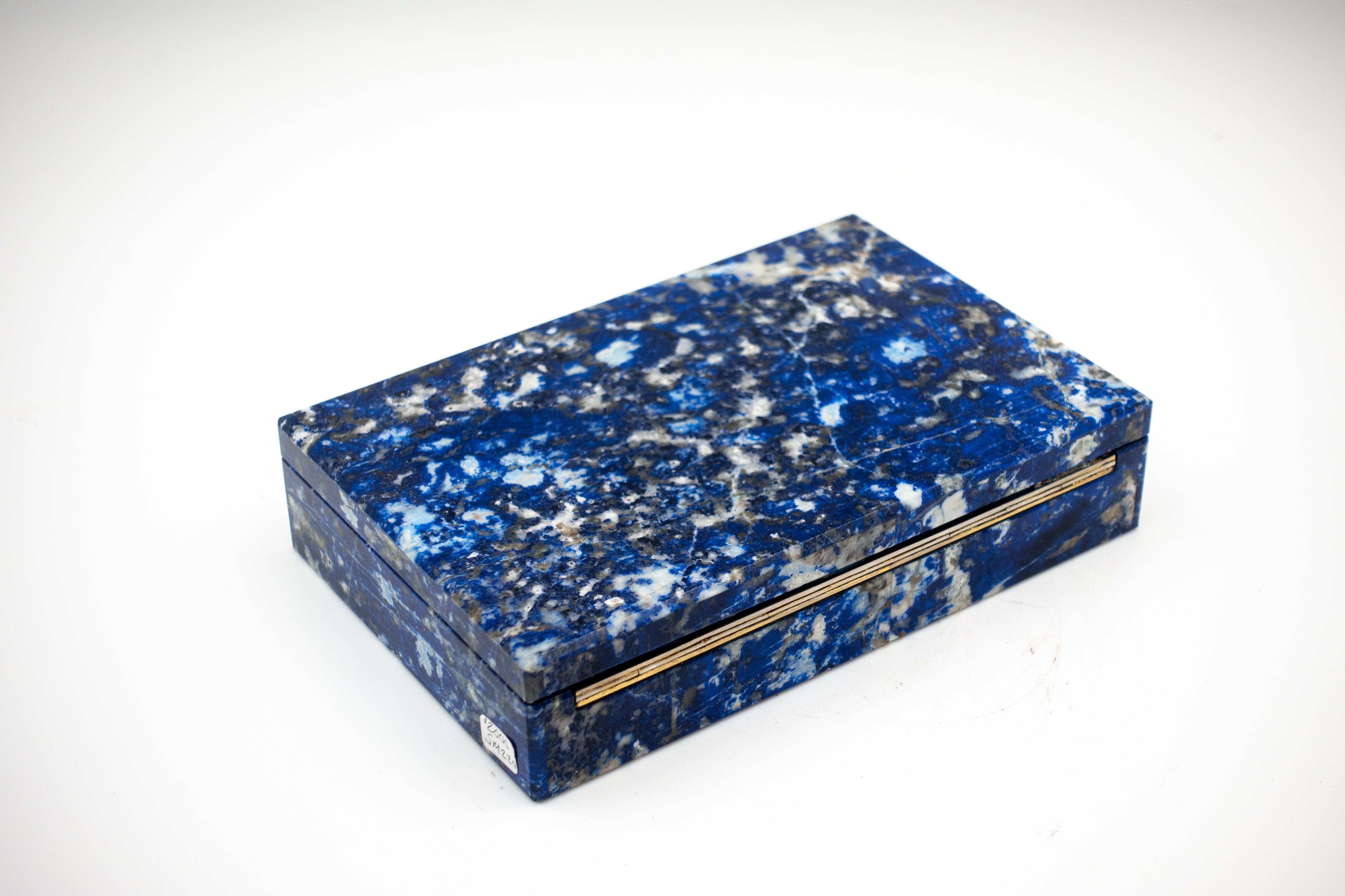 Beautiful Sodalite box with hinged lid. Sodalite is a rich royal blue tectosilicate mineral widely used as an ornamental gemstone.  Sodalite is believed to encourage rational thought, objectivity, truth and intuition, along with verbalisation of
