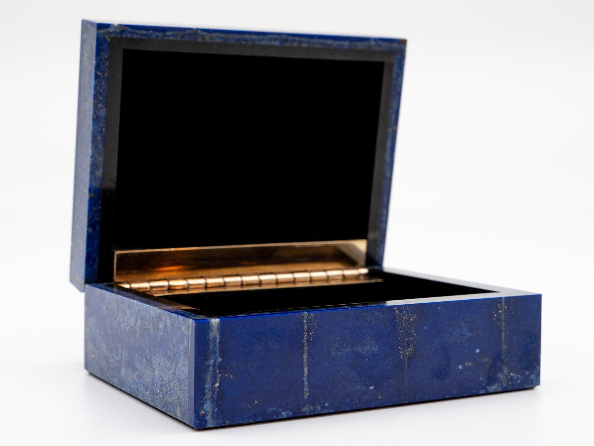 Beautiful lapis lazuli box with hinged lid. Mined in Afghanistan, it was then cut, polished, and created for us in India. Afghanistan was the main source of lapis for the ancient Egyptians and Mesopotamians, as well as the Greeks and Romans. This