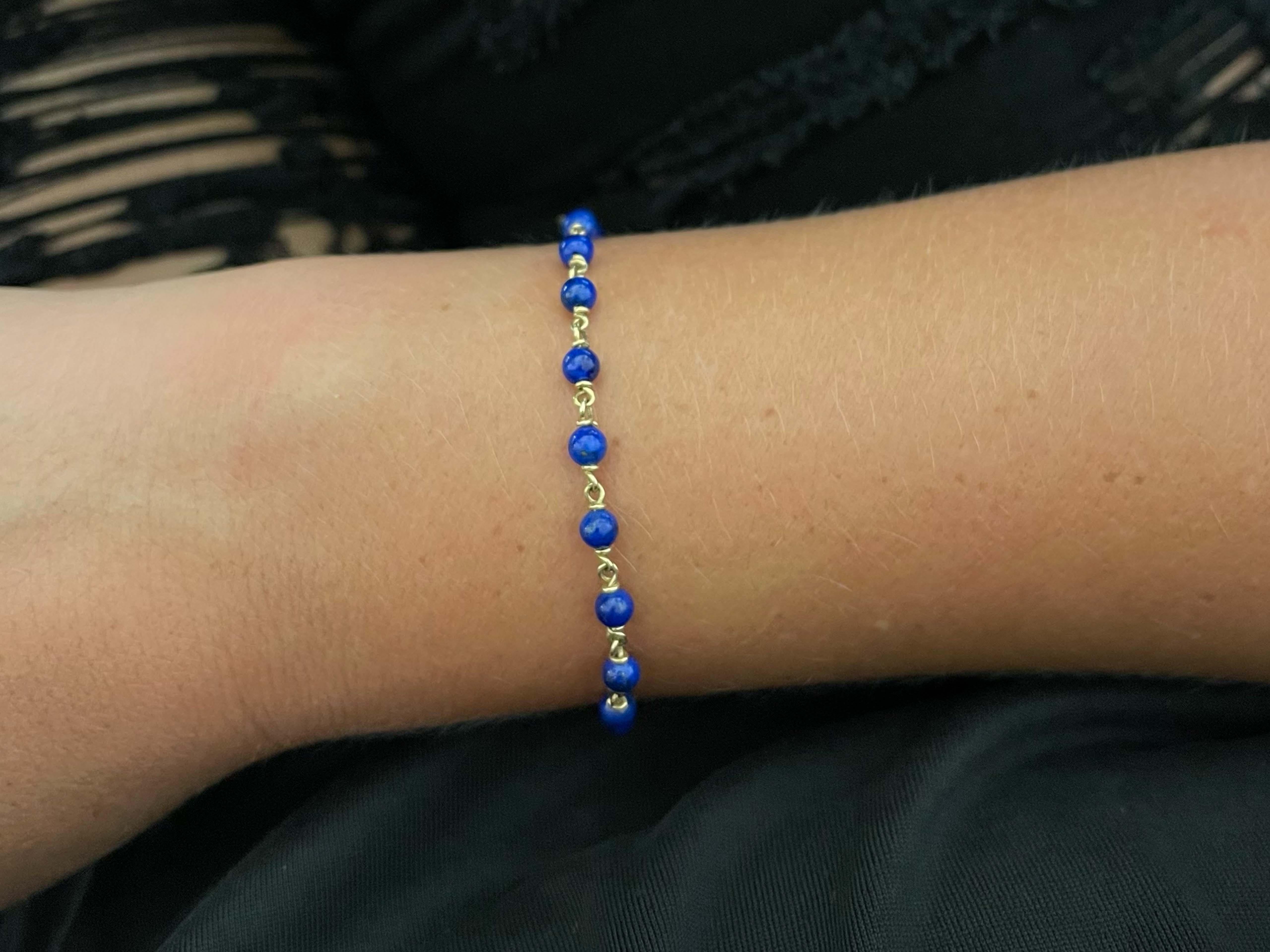 Bracelet Specification:

Total Weight: 4.8 Grams

Lapis Lazuli Diameter: 4.3 mm

Bracelet Length: 7 inches

Lapis Lazuli Count: 20 

Condition: Preowned, excellent

Stamped: 