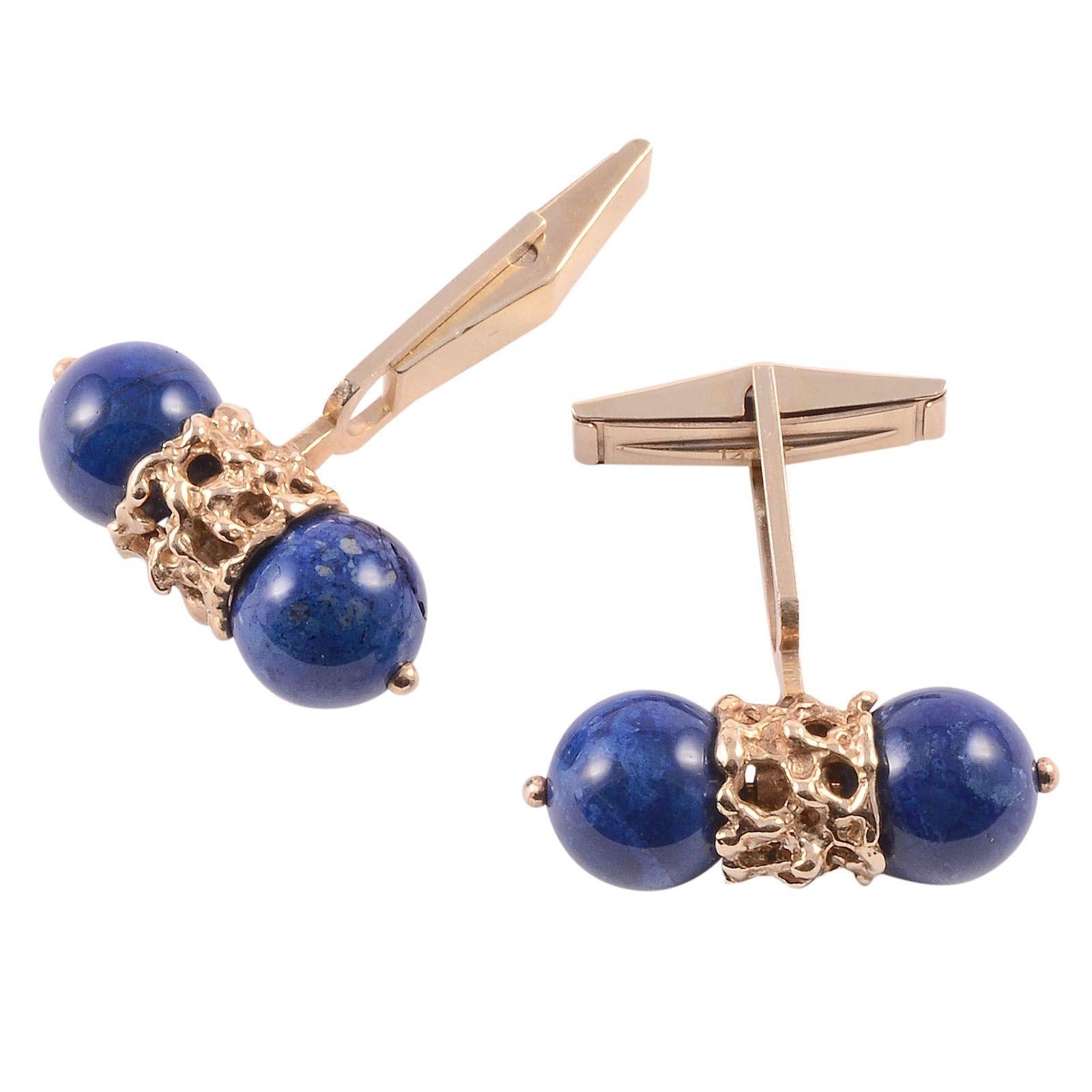 Vintage lapis lazuli cufflinks, circa 1960. Each 14 karat yellow gold cufflinks have two round natural 8.96mm lapis lazuli beads. Two beads on these lapis cuff links have hairline cracks. These vintage lapis cufflinks are appraised at $1,103. [SJ