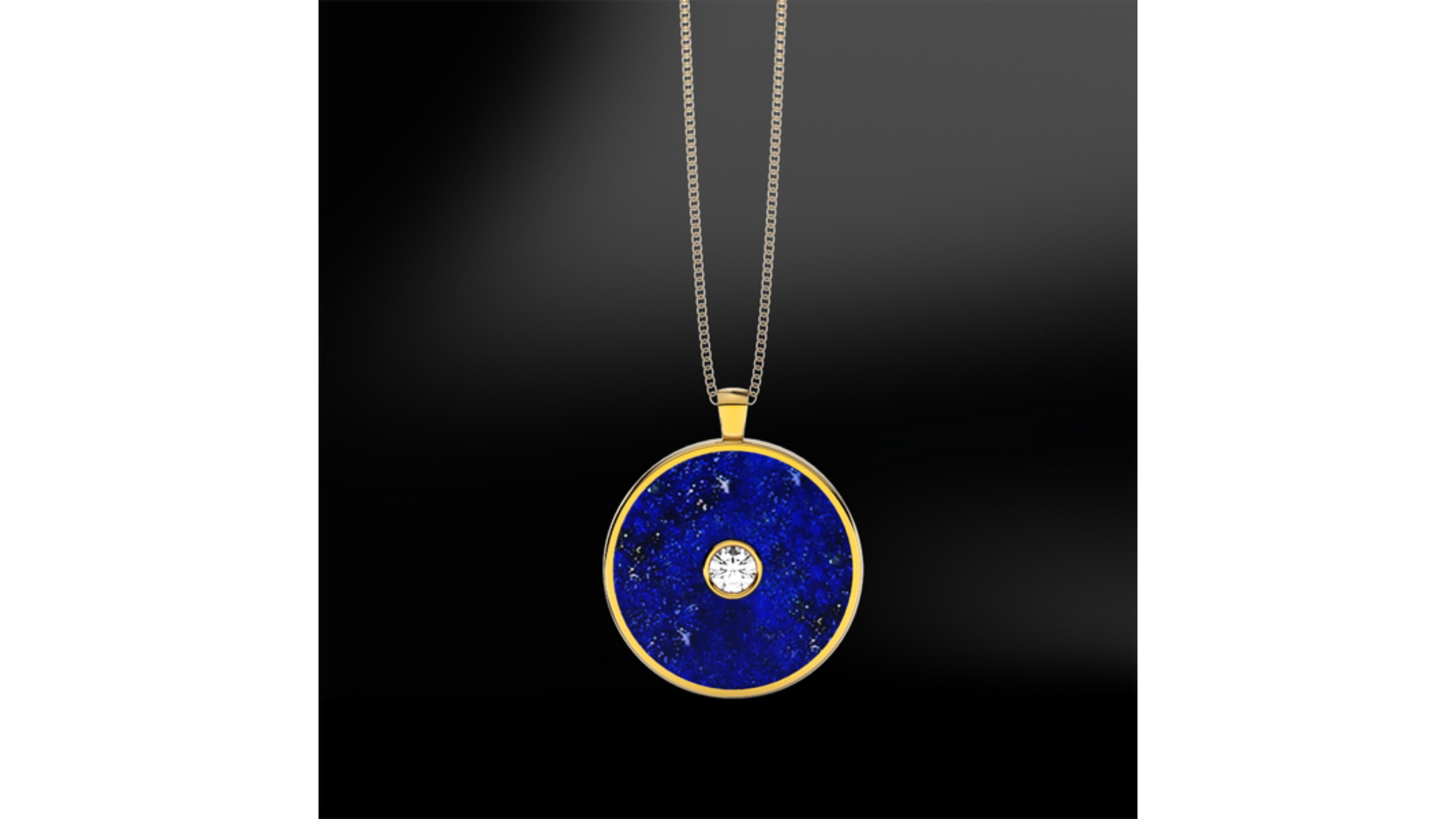 

  Lapis Lazuli Diamond Necklace 18k Yellow Gold                                            

This Lapiz Lazuli necklace stands out in this unique design with a diamond in centre. You can have this made in White Or Rose Gold too and with any