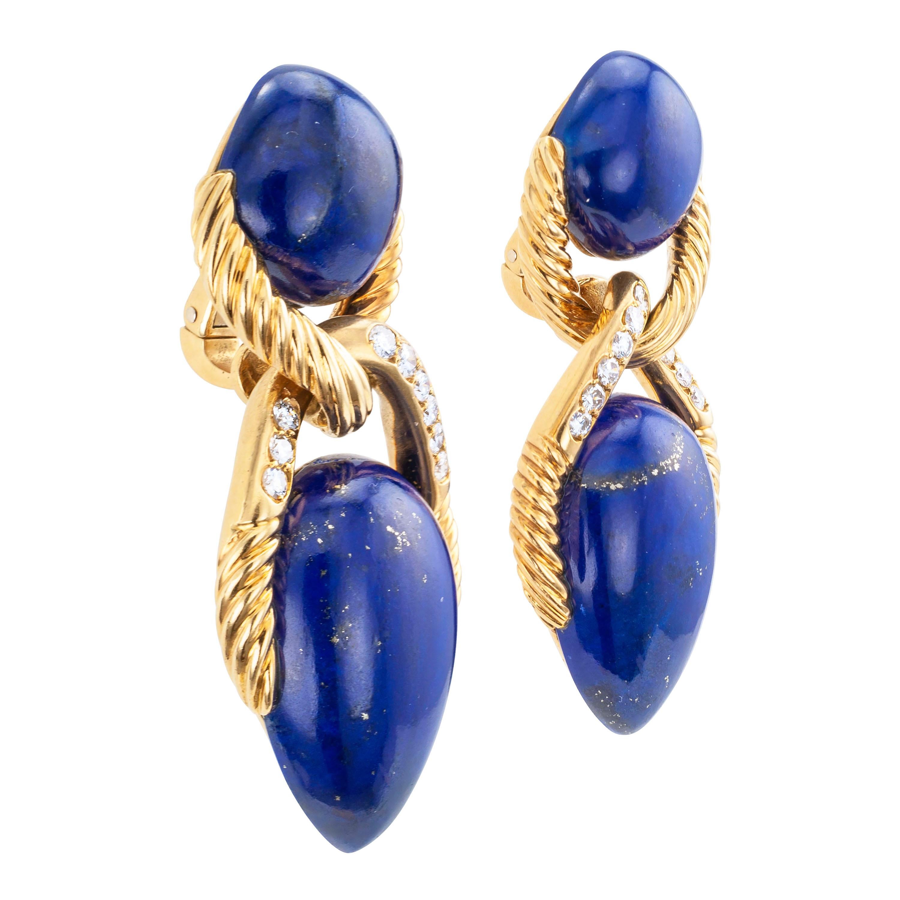 Spritzer and Fuhrmann  lapis lazuli diamond and gold drop clip on earrings circa 1970.

DETAILS:
DIAMONDS: eighteen round brilliant-cut diamonds totaling approximately 1.00 carat, approximately G – H color and VS clarity.

GEMSTONES: four lapis