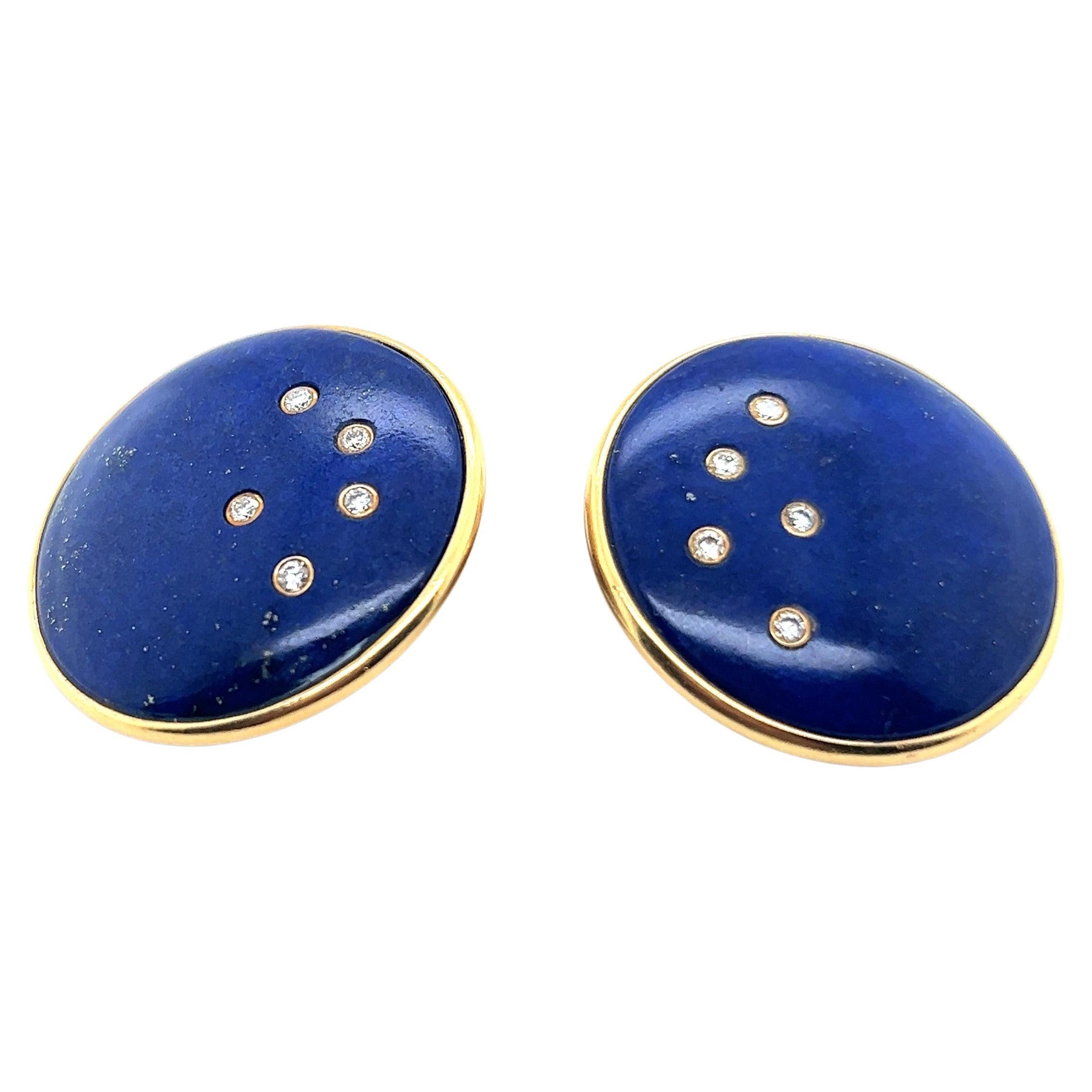 Exceptional Lapis lazuli earrings in yellow gold by Swiss jeweller Robert Vogelsang.

Designed with 18 Karat Yellow Gold, these earrings exude an enchanting and timeless appeal.  The rich blue of Lapis lazuli pairs beautifully with 10 brilliant cut