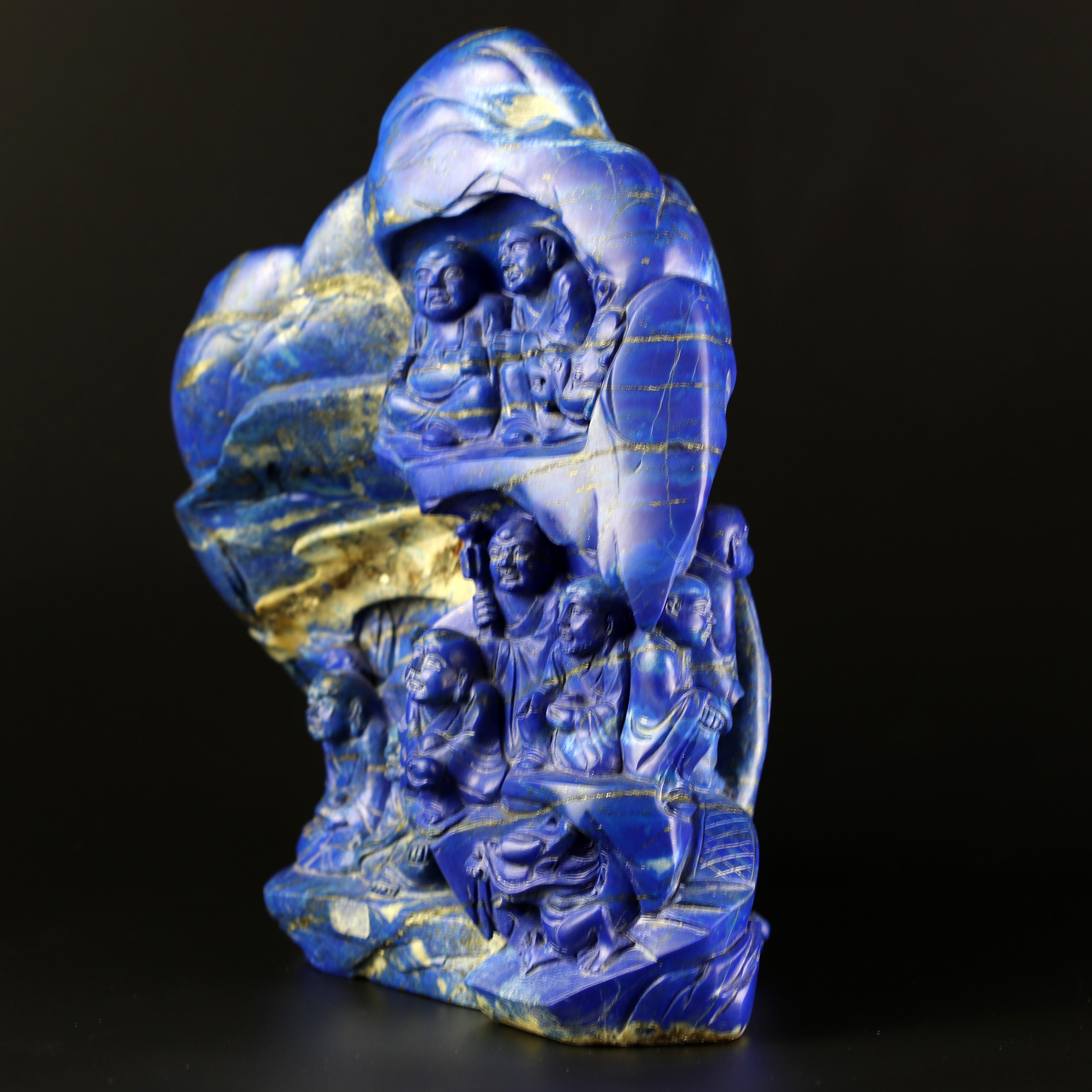 This series of Lapis Lazuli is definitely the part of the collection of which we are more fond of. This Eighteen Wise Men sculpture is from Hong Kong during the 70's. Fall in love with the passionate colour of this precious gem. Fantastic local