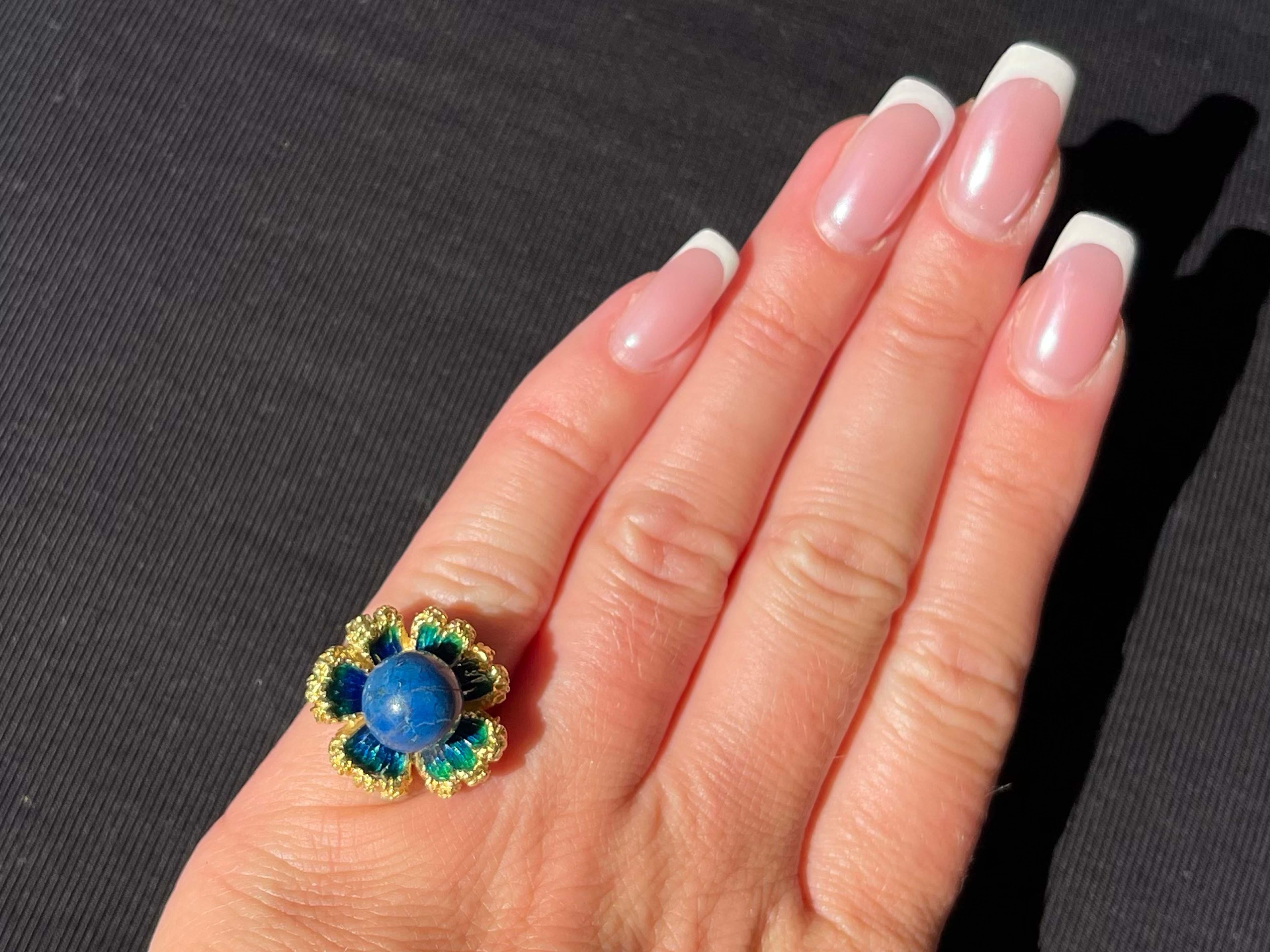 Item Specifications:

Metal: 18K Yellow Gold

Style: Statement Ring

Ring Size: 4.5 (resizing available for a fee)

Total Weight: 11.2 Grams

Gemstone Specifications:

Gemstones: 1 blue lapis lazuli

Condition: Preowned, excellent

Stamped: 