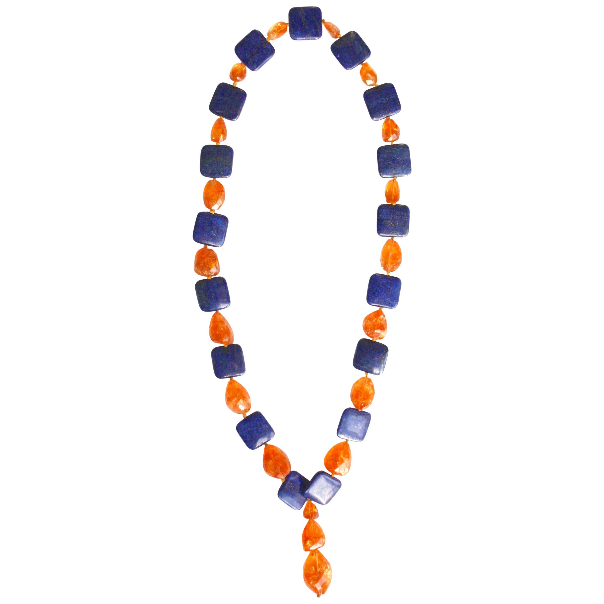 Long collier de pierres du soleil facettées en lapis-lazuli en vente