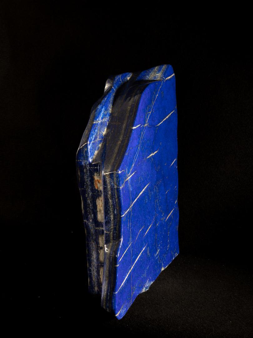 Very intense good quality lapis blue with shiny pyrite details. Large piece.