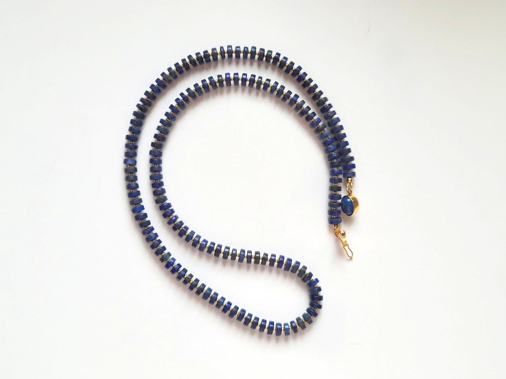 The length of the necklace is 26 inches ( 66 cm). The size of the rondelle beads is 7 mm.
The necklace is made of gems in saturated, deep, dark blue with inclusions of gold pyrite.
Authentic, natural color. No thermal or other mechanical treatments