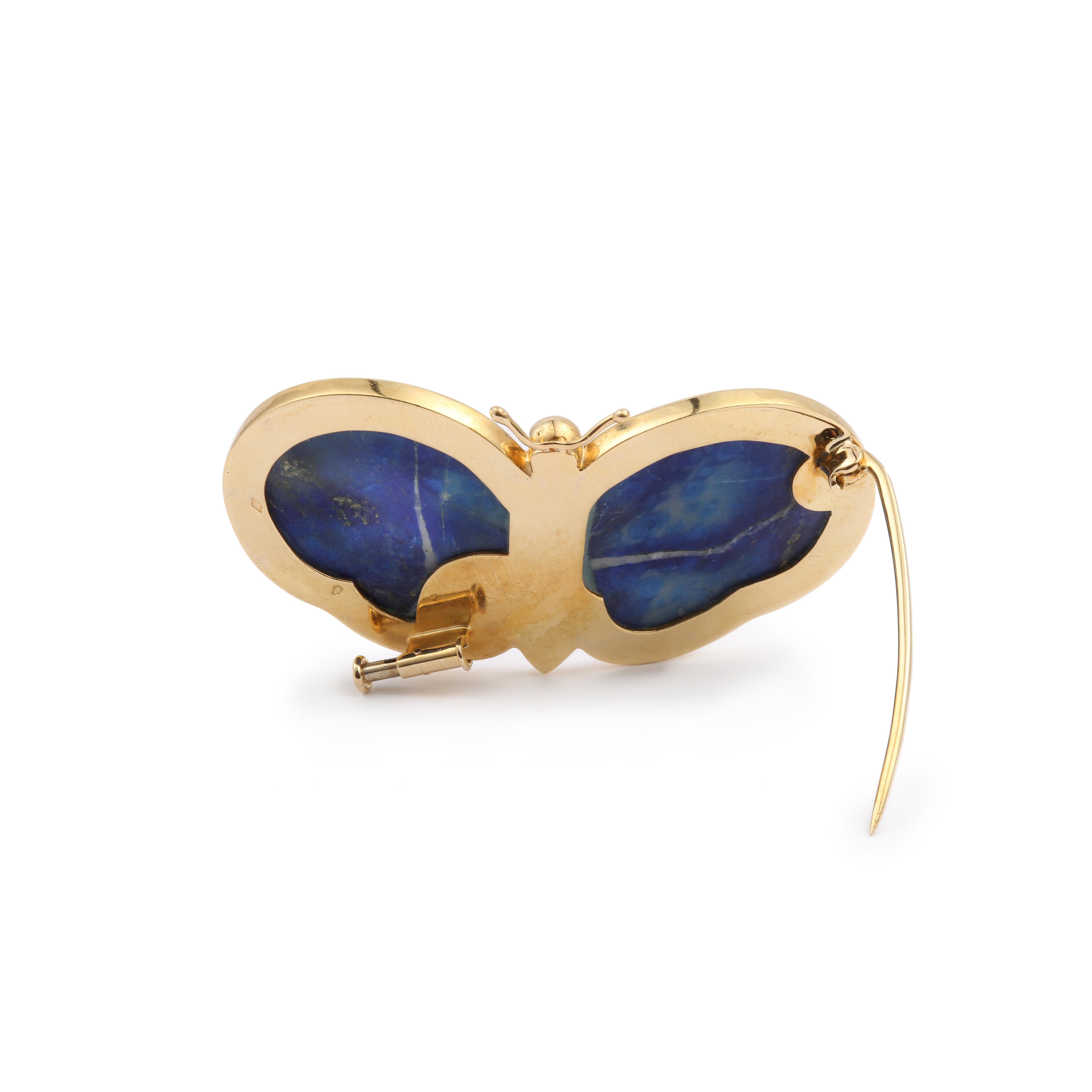 Yellow gold butterfly brooch with jasper body and lapis lazuli wings.

Dimensions : 54 x 28.49 x 8.70 mm (2.126 x 1.121 x 0.342 inch)

Weight of the brooch: 15 g

Piston clasp.

French work circa 1970

18 carat yellow gold, 750/1000th (eagle head
