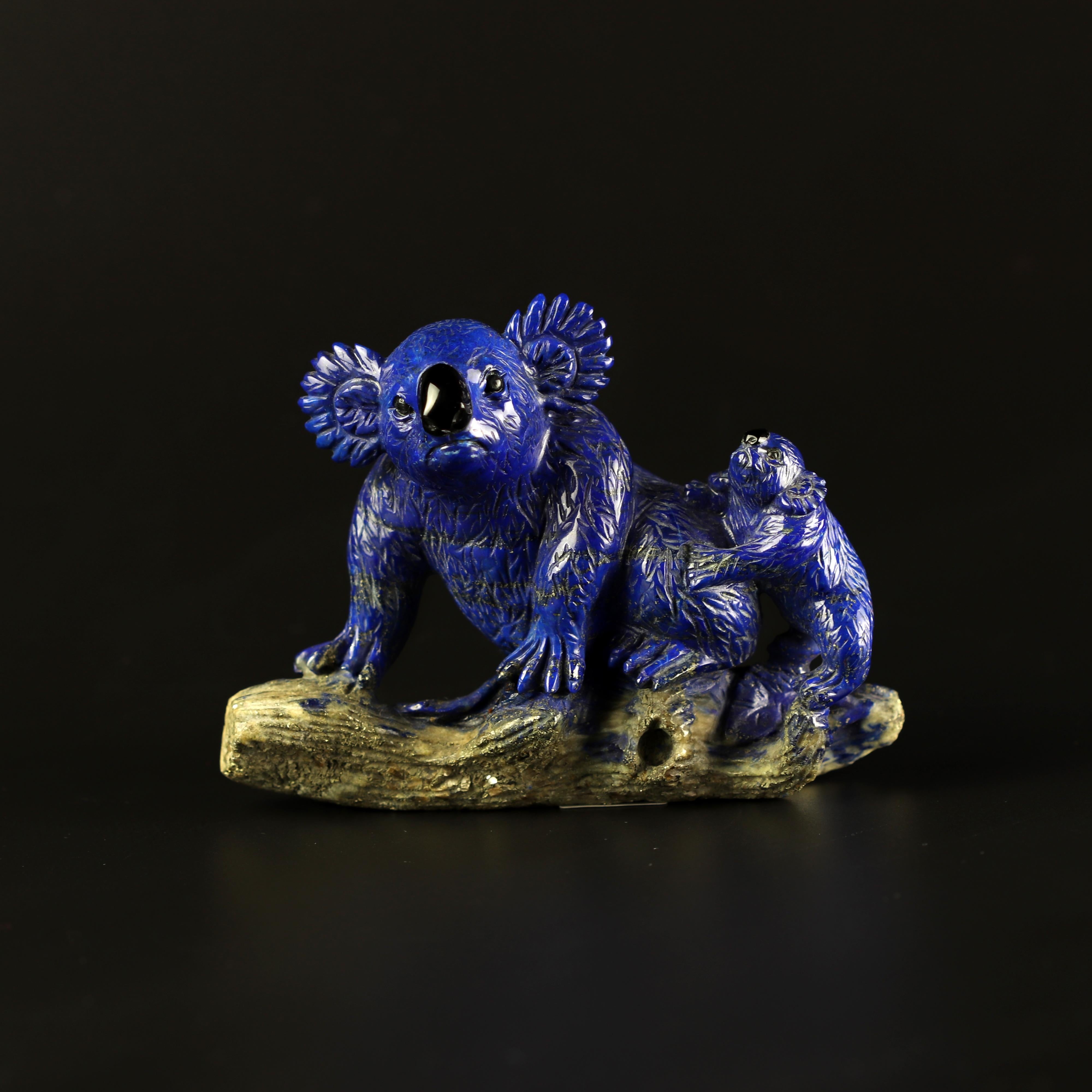 Important acquisition in the late 1970s in Hong Kong. This gentil gemstone offers a passionate colour in a precious way. Carved with extreme detail by fantastic local artists which transform raw stones into unique art works. This Koala family