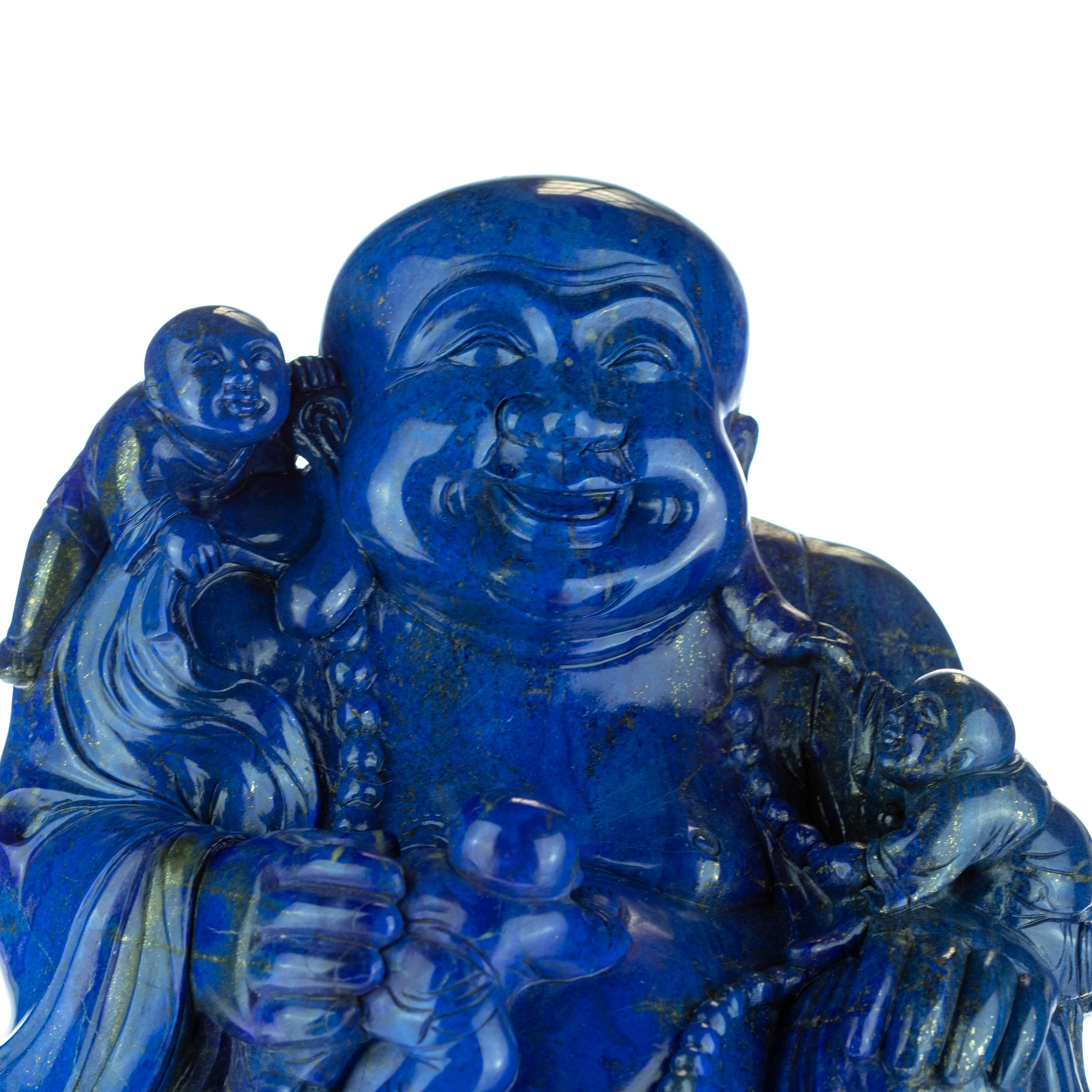 ceramic laughing buddha statue